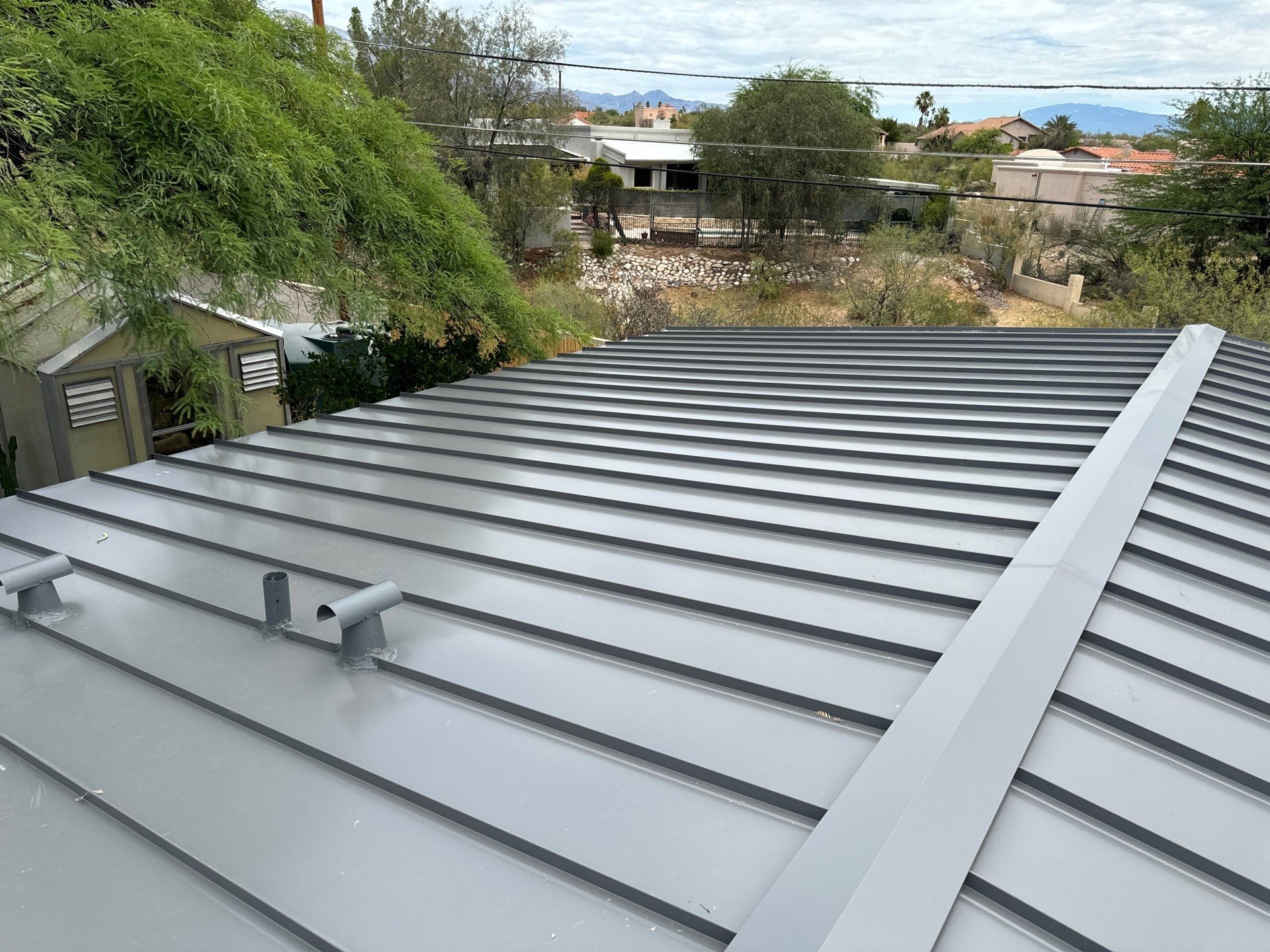 Charcoal Gray Standing Seam by Reimagine Roofing