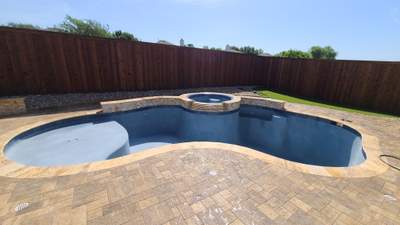 Freeform Pool with Raised Stone Spa