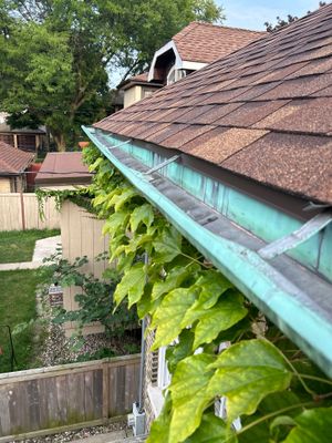 Why Maywood Gutters Clog and Ice Up