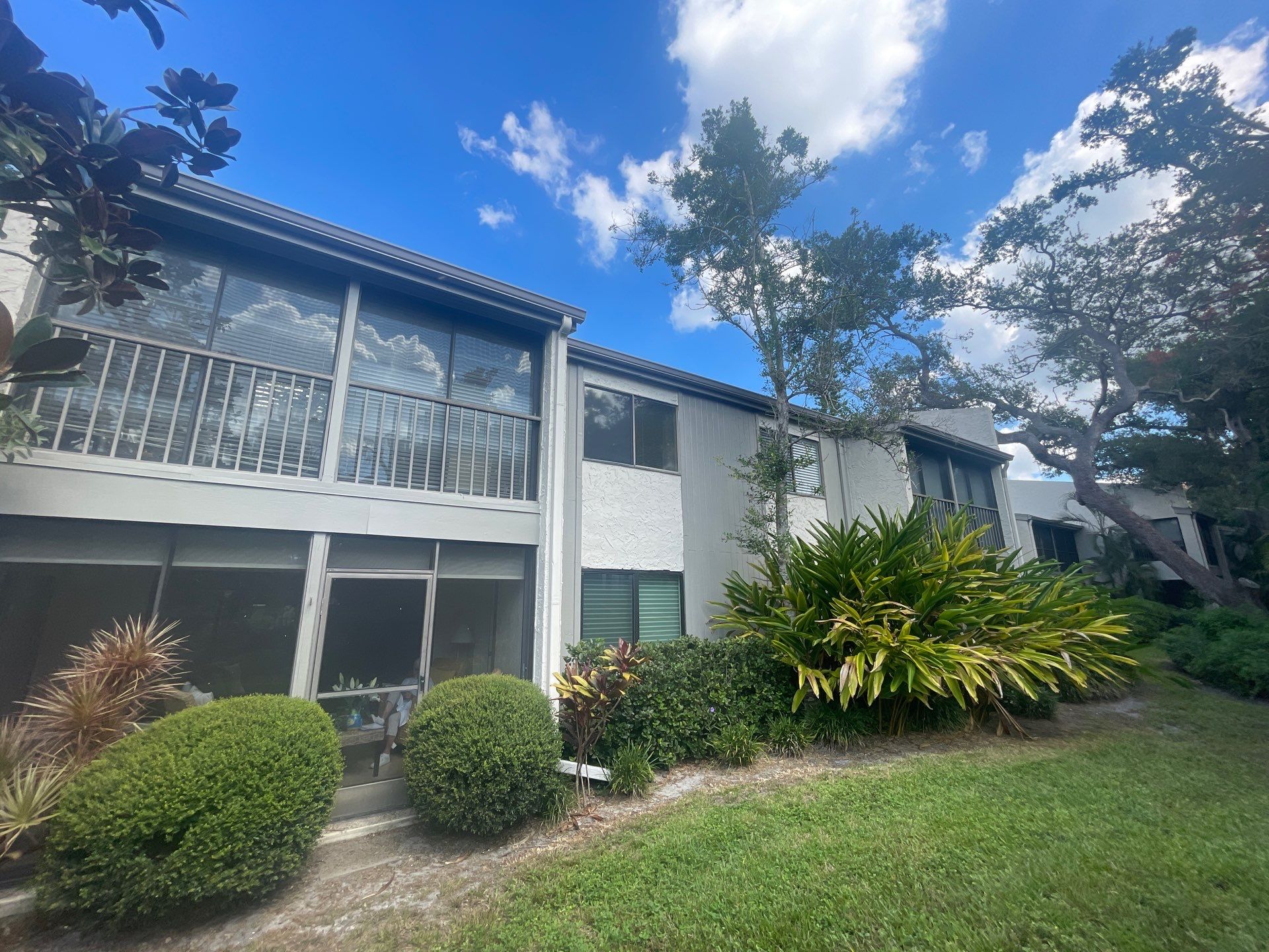 Clean Gutters and Roof in Sarasota FL by Gutter Professors