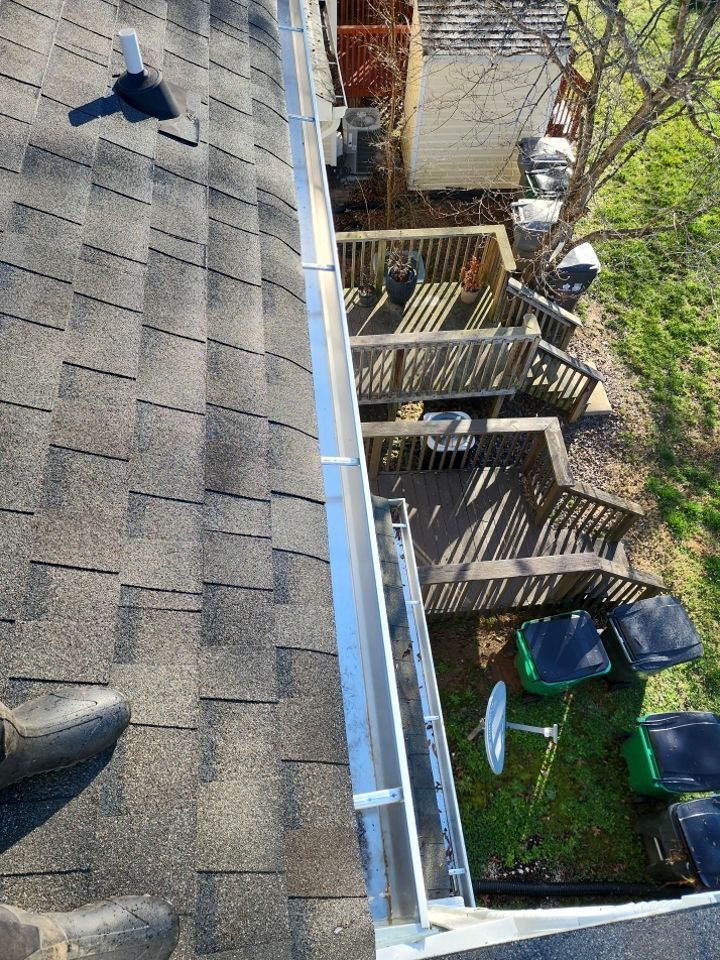 Gutter Cleaning using water by Power Wash Masters LLC