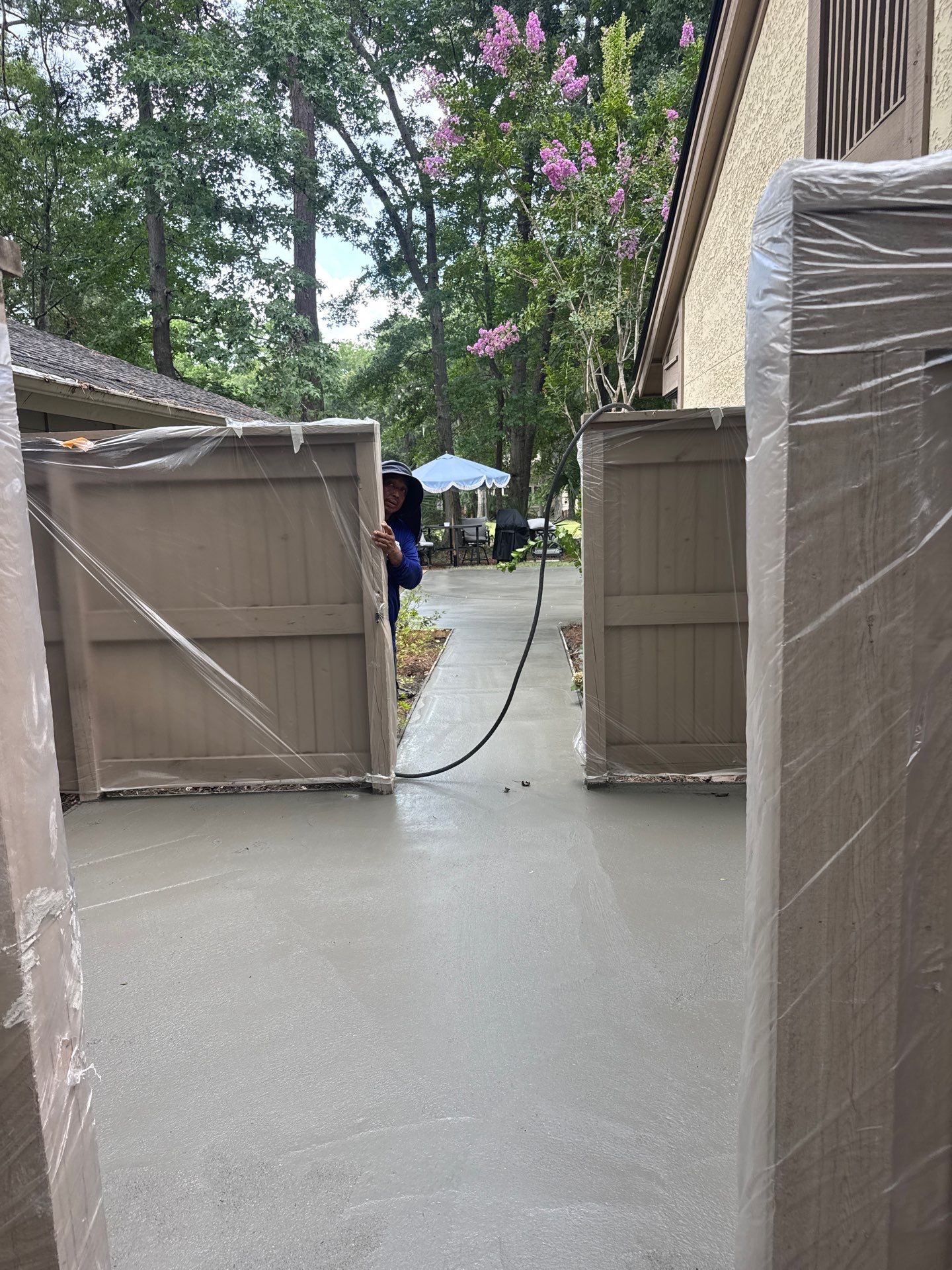 Custom Concrete Patio and Herringbone Paver Walkway in Hilton Head Island by Lowcountry Scapes, LLC
