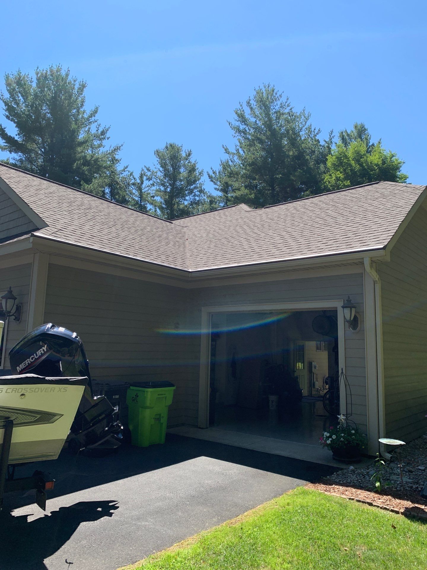 Gutter Helmet Installation on a Multi-Level Traverse City Residence by Rainbow Seamless Systems