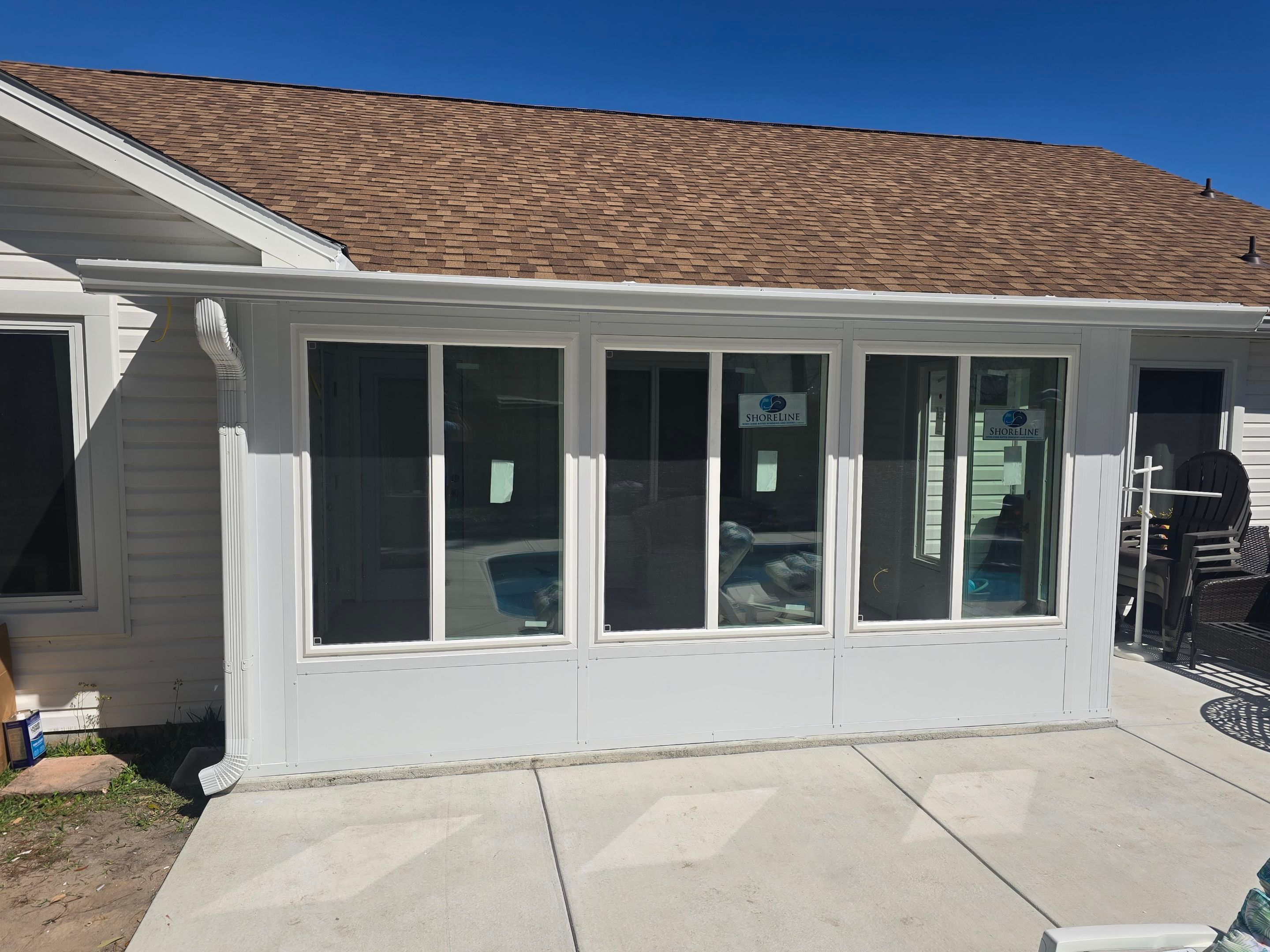 Poolside Glass Room in Gulf Breeze by Titan Sunrooms