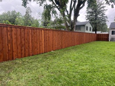 Board on Board Wood Privacy Fence Installation in Cedar Falls