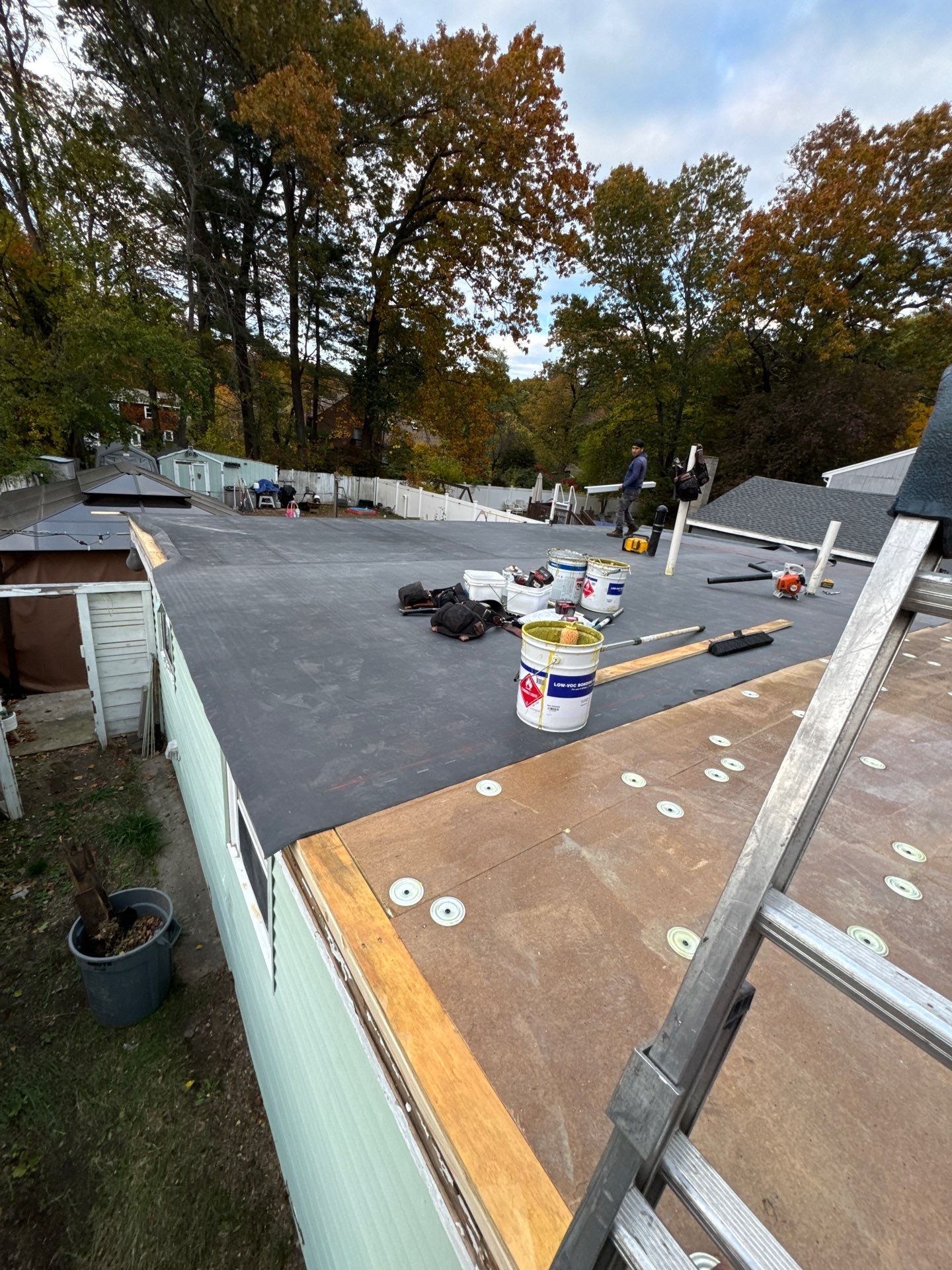 Westford EPDM Flat Roof with Gutter & Soffit/Fascia Replacement by Mighty Dog Roofing of Greater Middlesex County