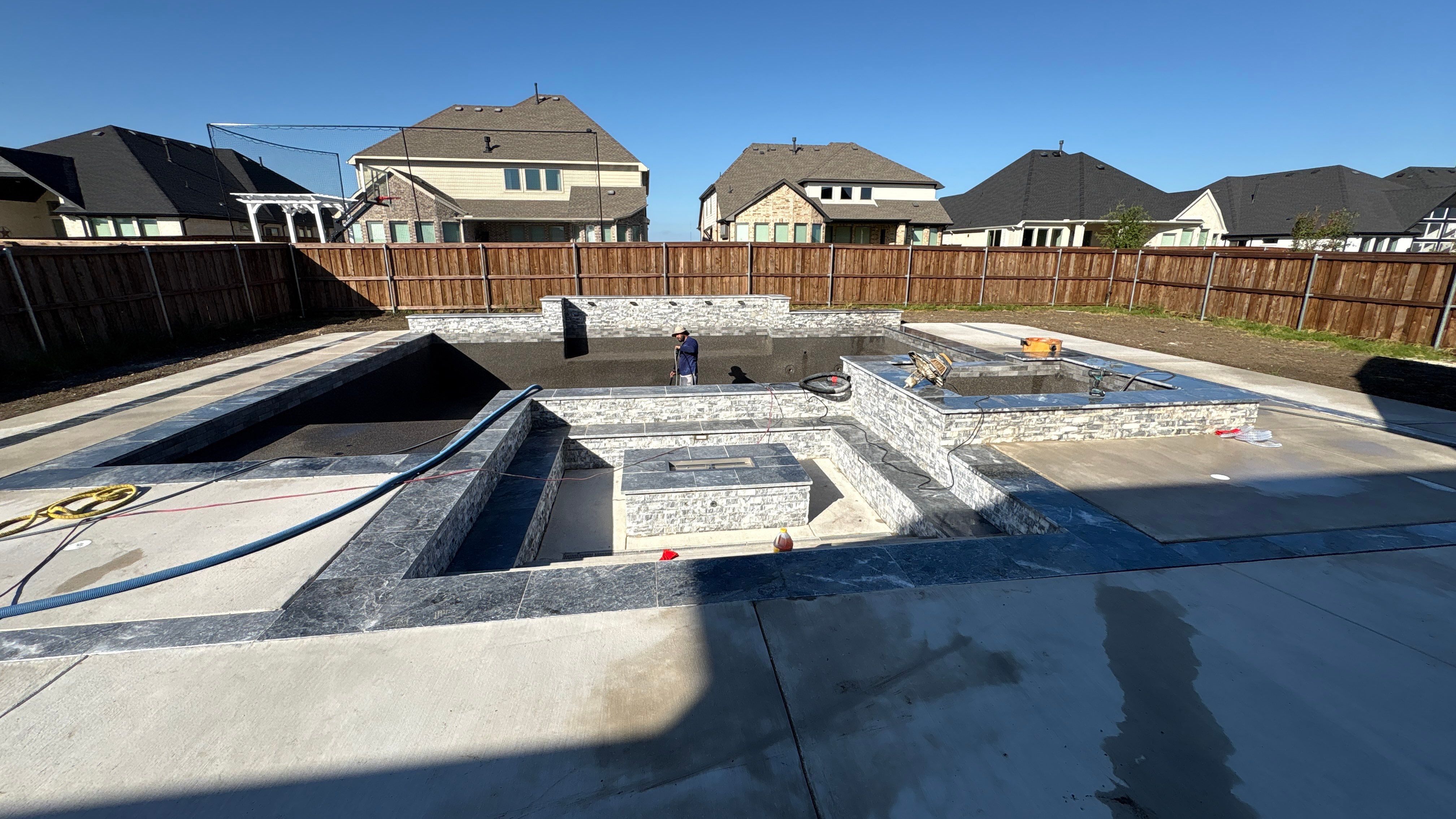 Geometric Pool with Raised Spa and Scupper Water Features by Pinnacle Pools and Spas - DFW
