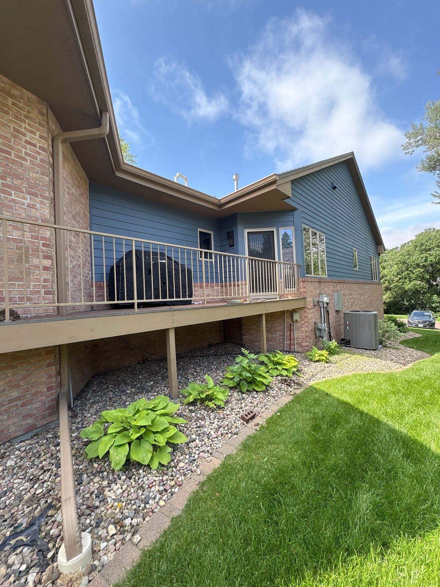 Residential Exterior Painting and Siding Refresh in Sioux Falls by Select Painting, Coatings & Garage Cabinets