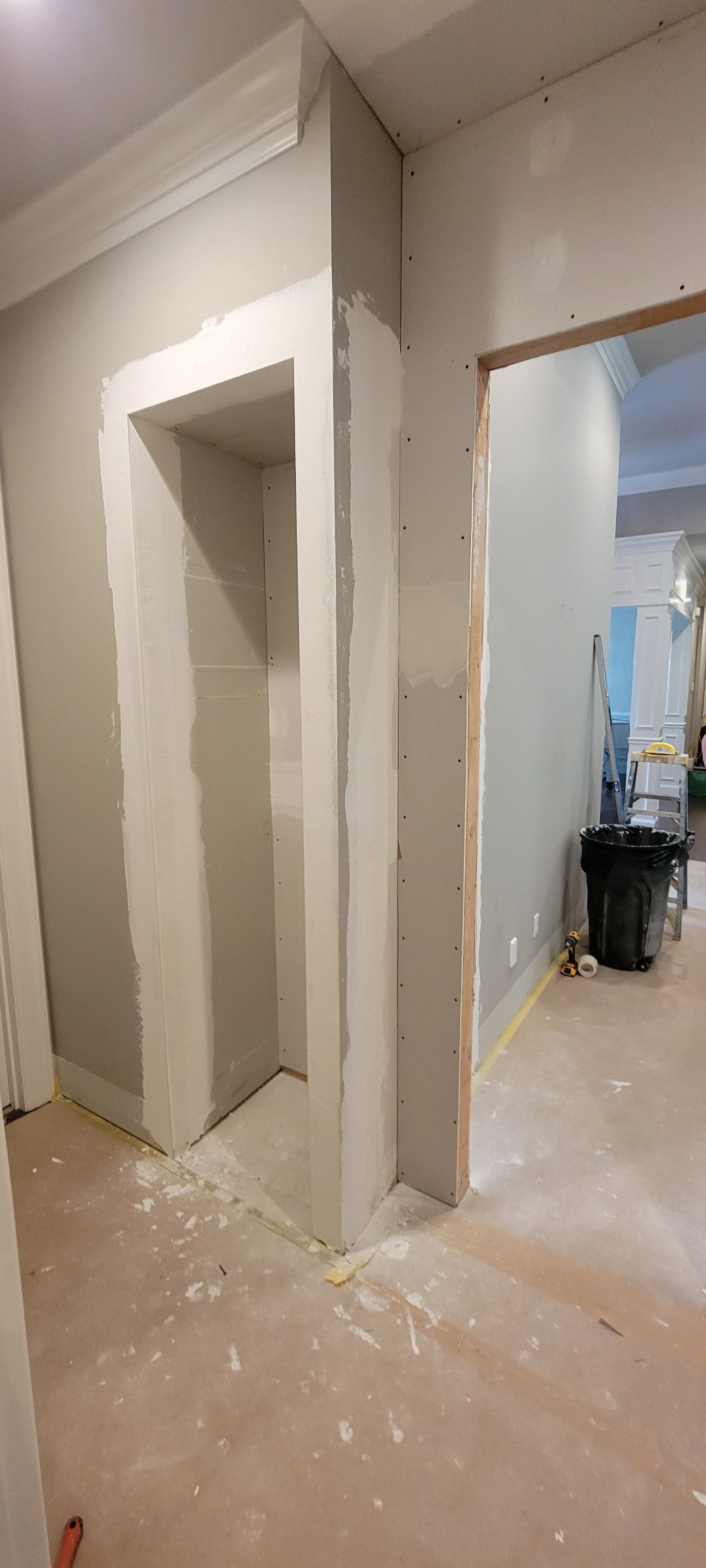 Closet transformation to coffee nook with custom shelves and LED lighting.  by Crm Services Llc