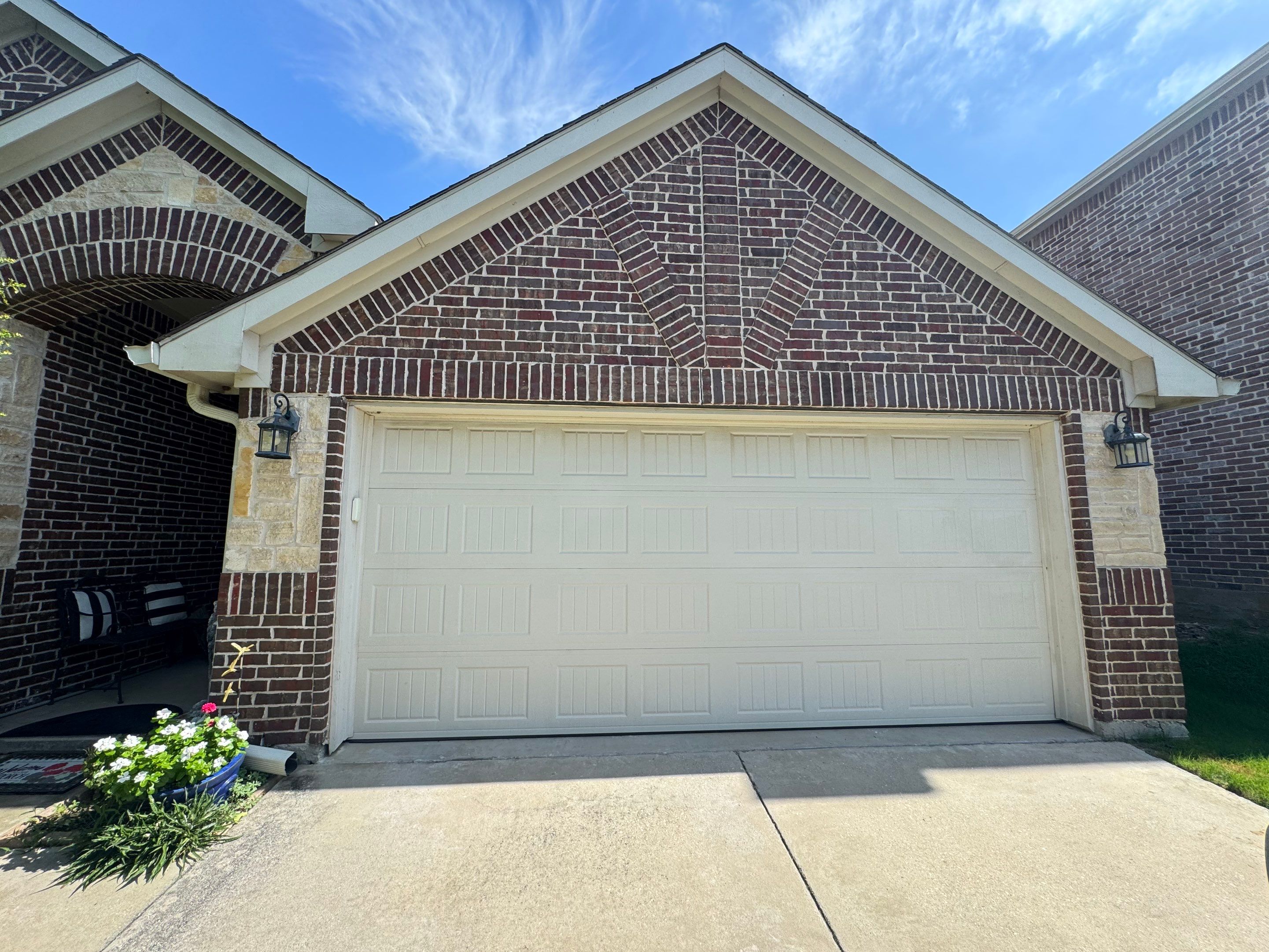 CHI Carriage Stamp Garage Door Installation With Decorative Hardware In Roanoke by Meadows Garage Doors