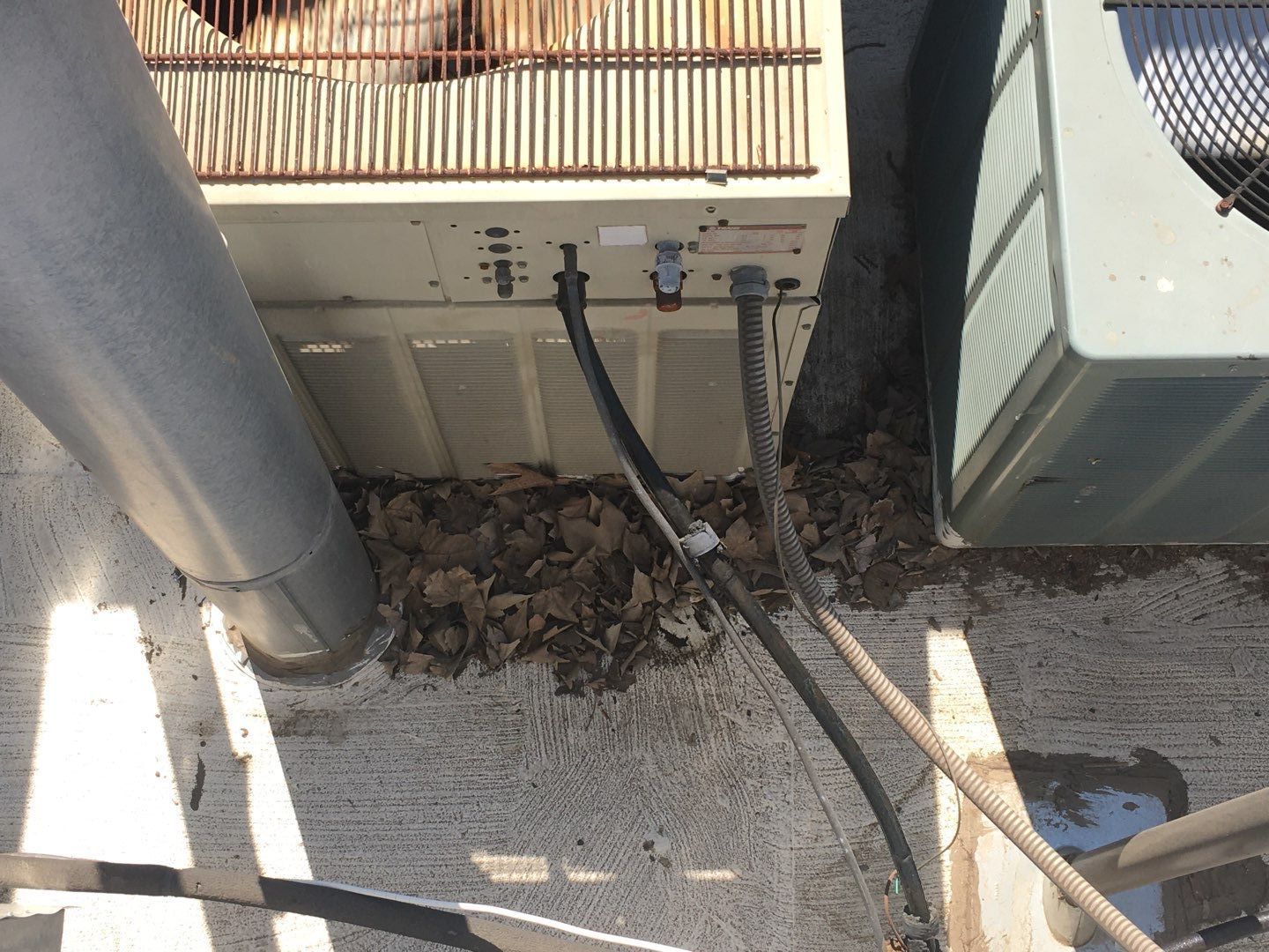 Spray foam and coatings inside commercial building HVAC well using Spray foam and coatings over existing BUR system by Straight Edge Roofing Inc