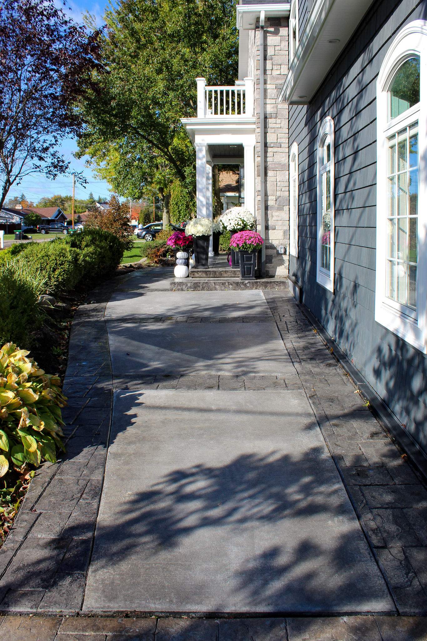 Exterior Renovations- Siding, Concrete, Railings, and Entry Door  by Ivy Lea Construction