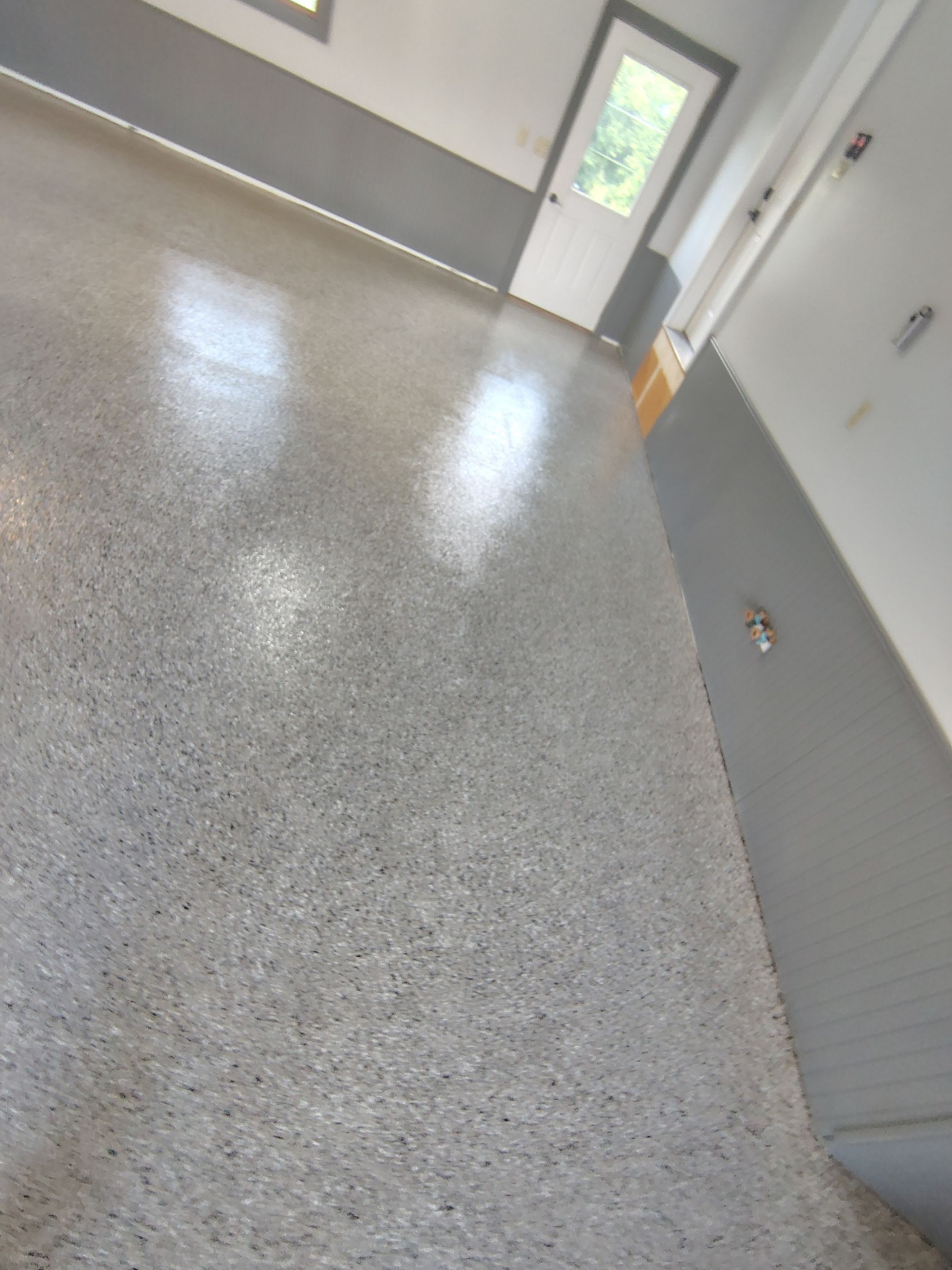 Multi-Fleck Epoxy Garage Floor Coating in Dell Rapids by Select Painting, Coatings & Garage Cabinets