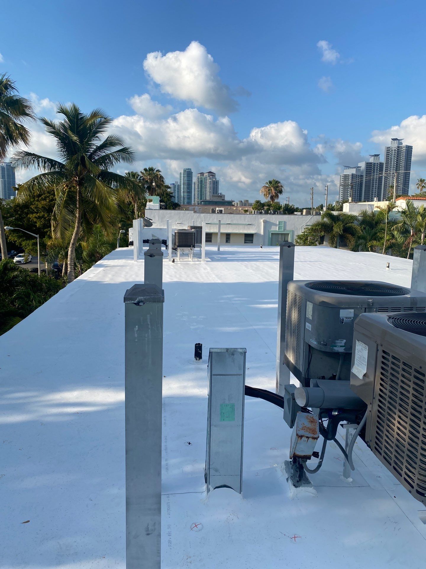 Miami Beach Condominium Complete Flat Roof and TPO Installation by AJF ROOFING INC