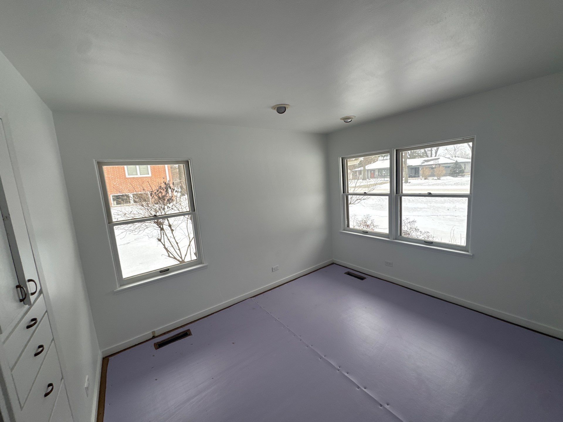 Black-Frame Pella Lifestyle Upgrade on a Partial Brick Home by United Windows and Siding LLC