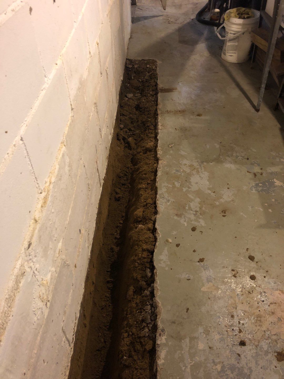 Basement Waterproofing using Drain tile system and a foundation wrap by ACE Waterproofing & Basement Solutions