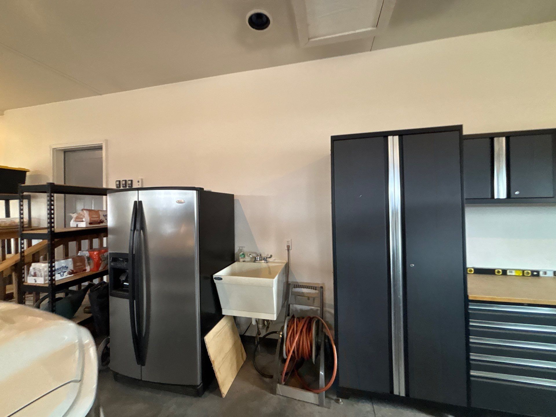 Multi-Car Garage Concrete Coating and Crack Repair in Dell Rapids by Select Painting, Coatings & Garage Cabinets
