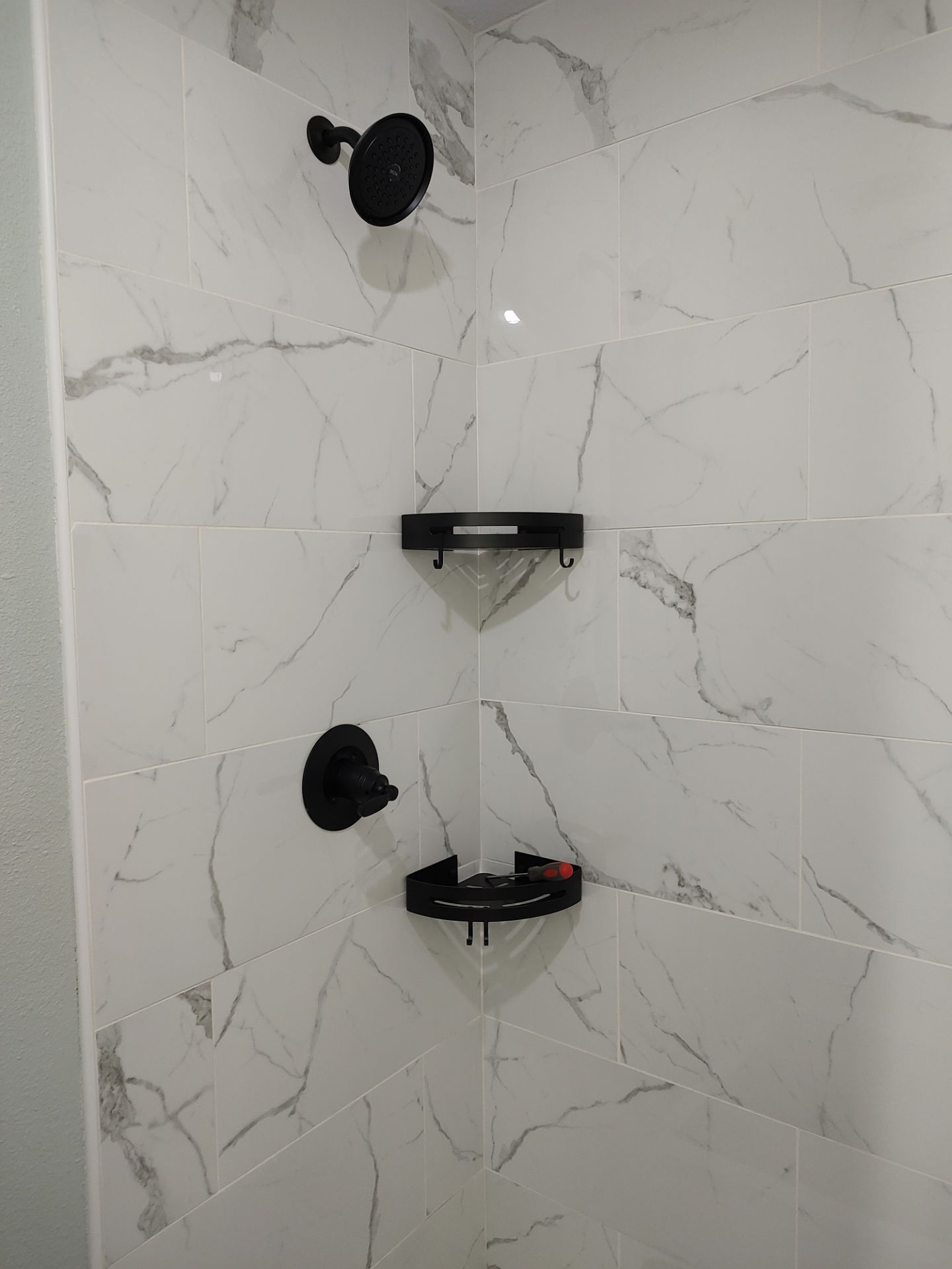 Bathroom remodel w/shower upgrade by In & Out Construction & Remodeling, LLC