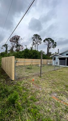 Wood Fence Installation using Wood and Chainlink Fence