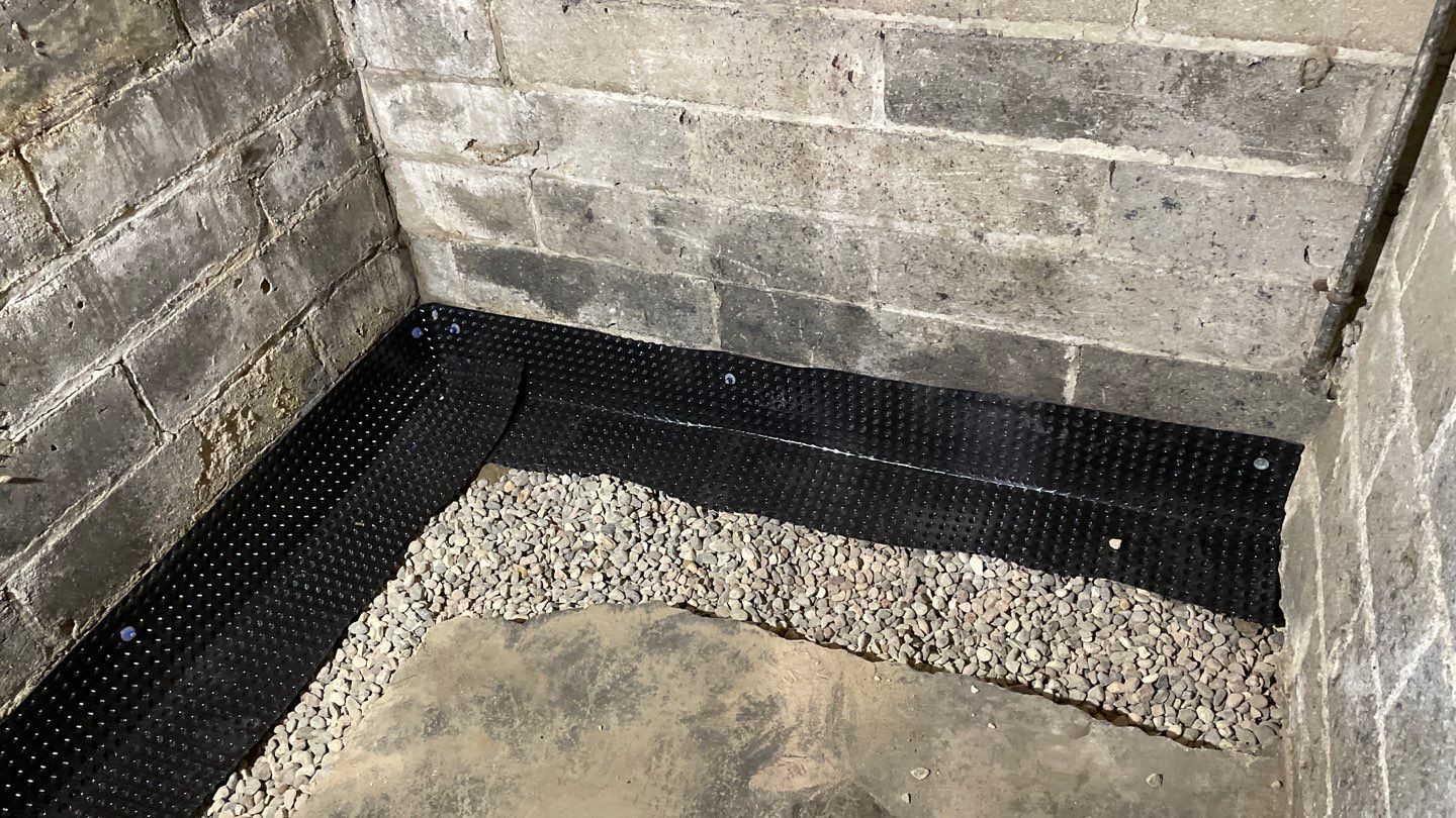 Interior Drain Tile for a South Minneapolis Basement by Waterproofing Northeast