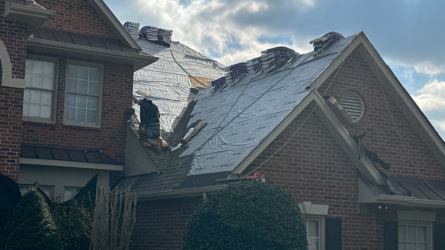 Residential Roofing Installation using GAF Timberline HDZ Weathered Wood Shingles by Undersun Roofing 