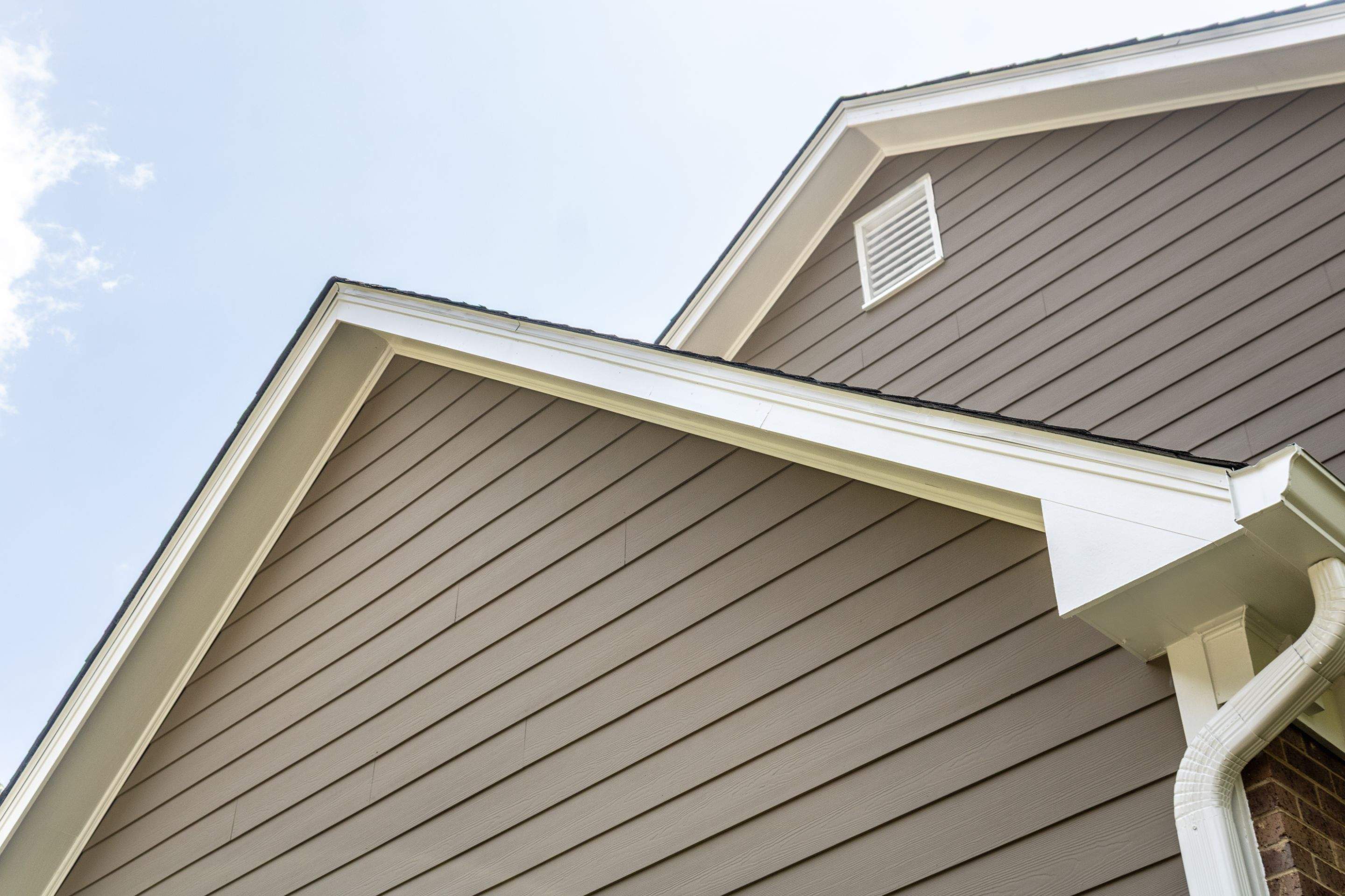 Siding Replacement and Exterior Painting using James Hardie Lap Siding and Sherwin Williams Paint by Nelson Exteriors 