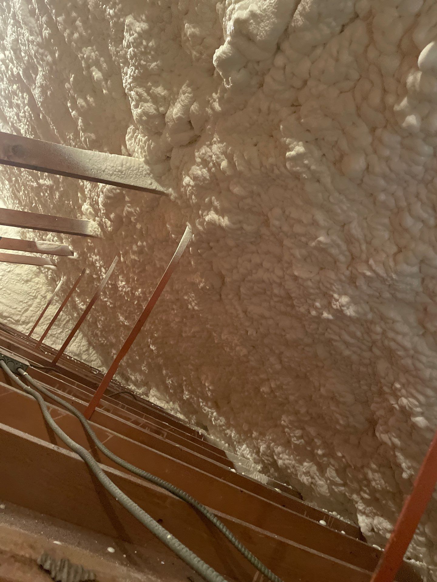 Attic Insulation using open cell spray foam by NYS Foam & Energy