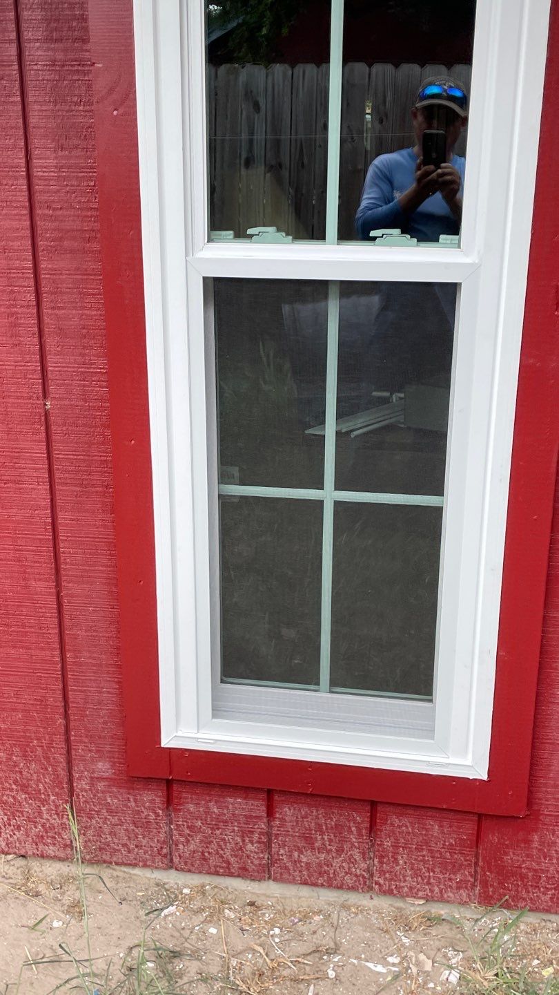 Black and white and red all over by Bayfront Roofing and Construction