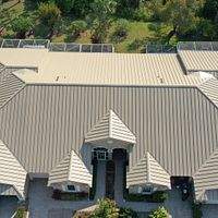 24ga 1.5" Mechanical Seam Sierra Tan by Total Roofing System The Metal Roof Experts