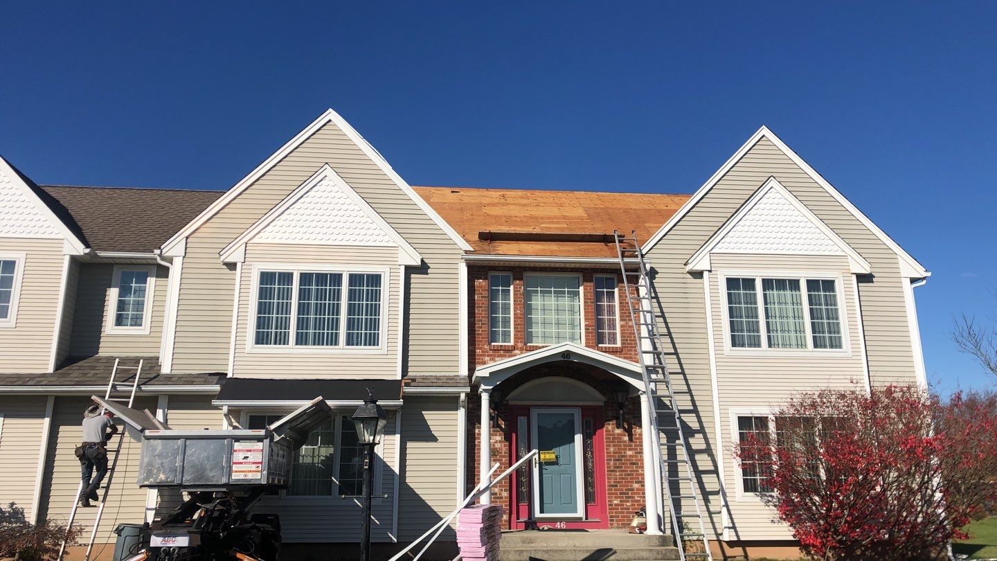 Commercial Roofing Installation using Owens Corning TruDefinition driftwood by A Plus Exterior