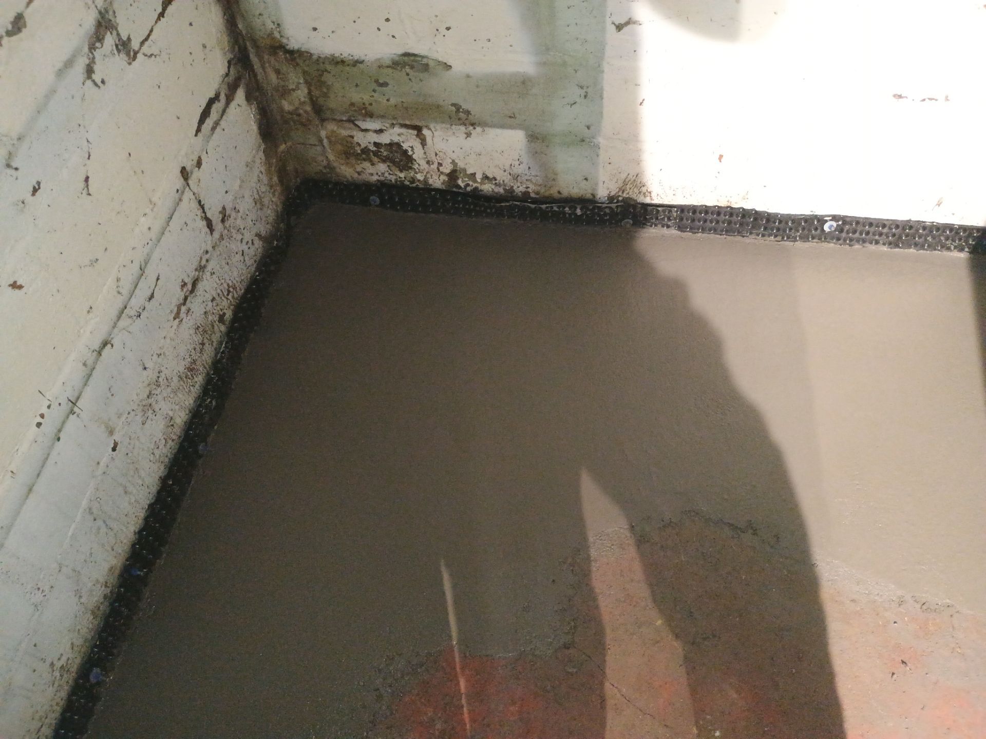 Interior Drain Tile & Sump Pump System in North Minneapolis by Waterproofing Northeast