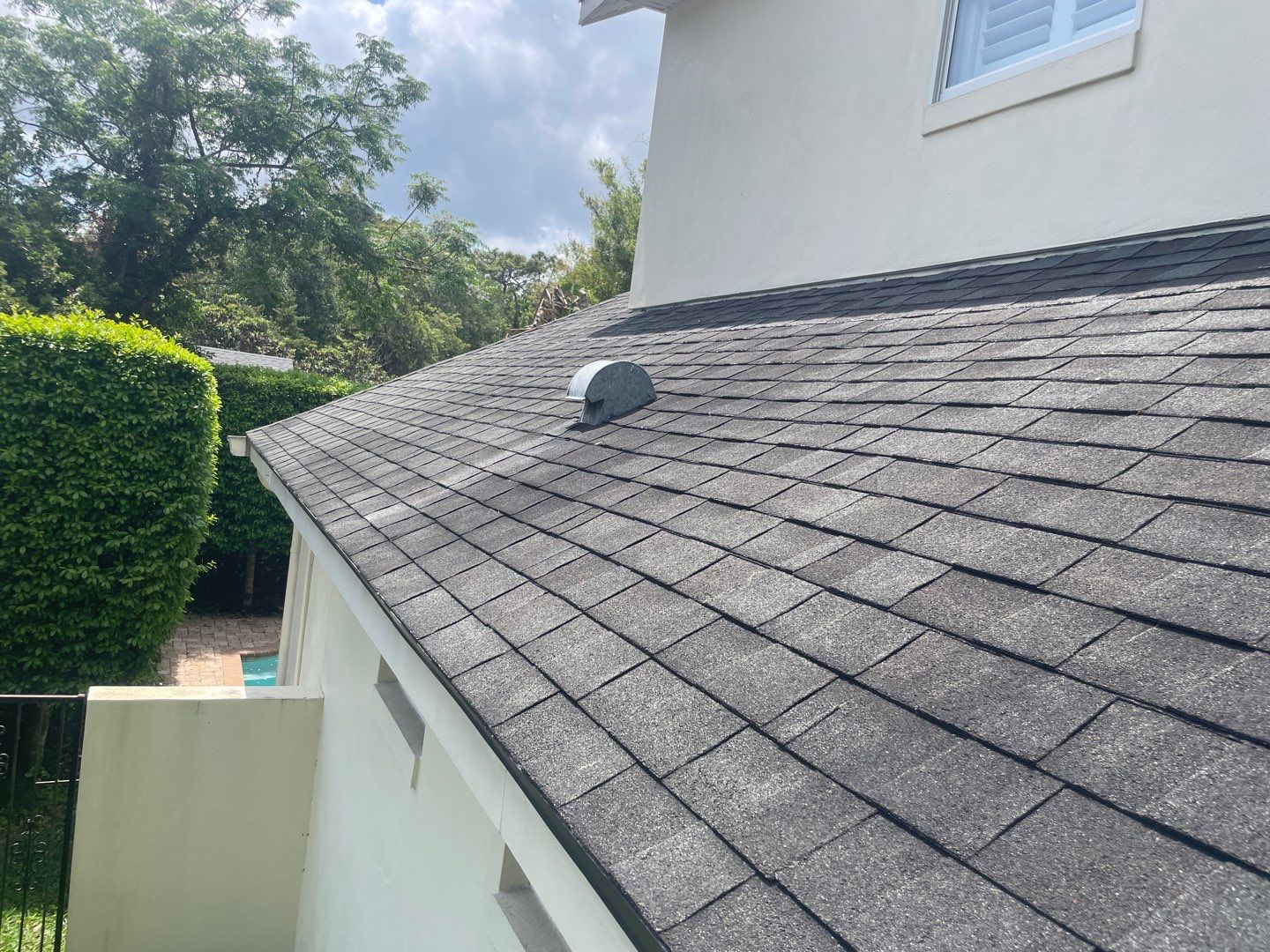 Architectural Shingle Re-Roof for Two-Story Winter Park Home by Tip Top Roofing Co., Inc.