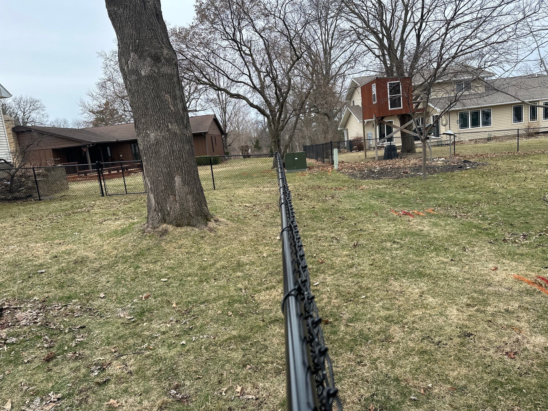 Black Vinyl Chain Link Fence Installation in Cedar Falls by Perfect Picket Fence and Stain