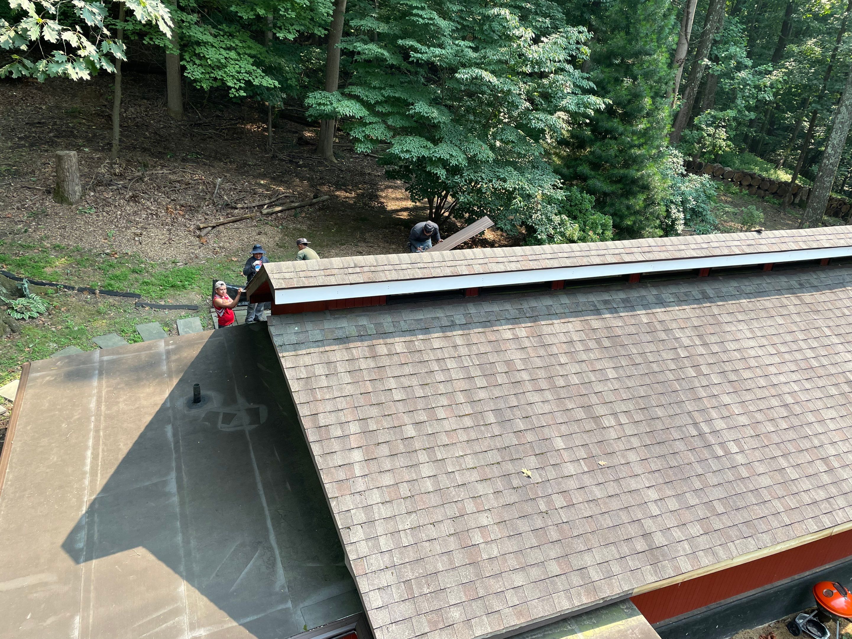 Deckhouse Roof Replacement by American Home Contractors