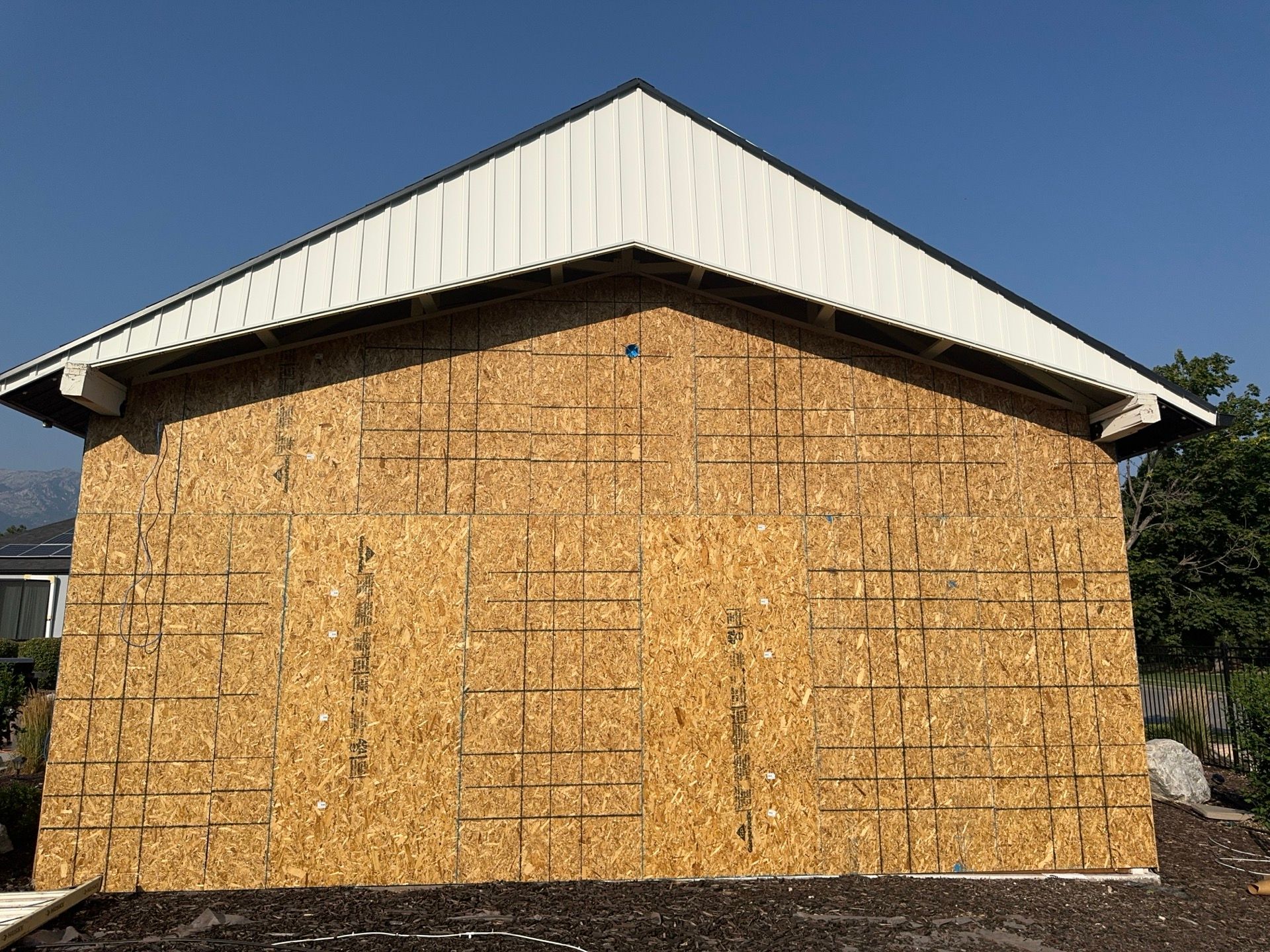 Highland | Modern Farmhouse Board & Batten | Arctic White & Black by Ideal Siding Utah