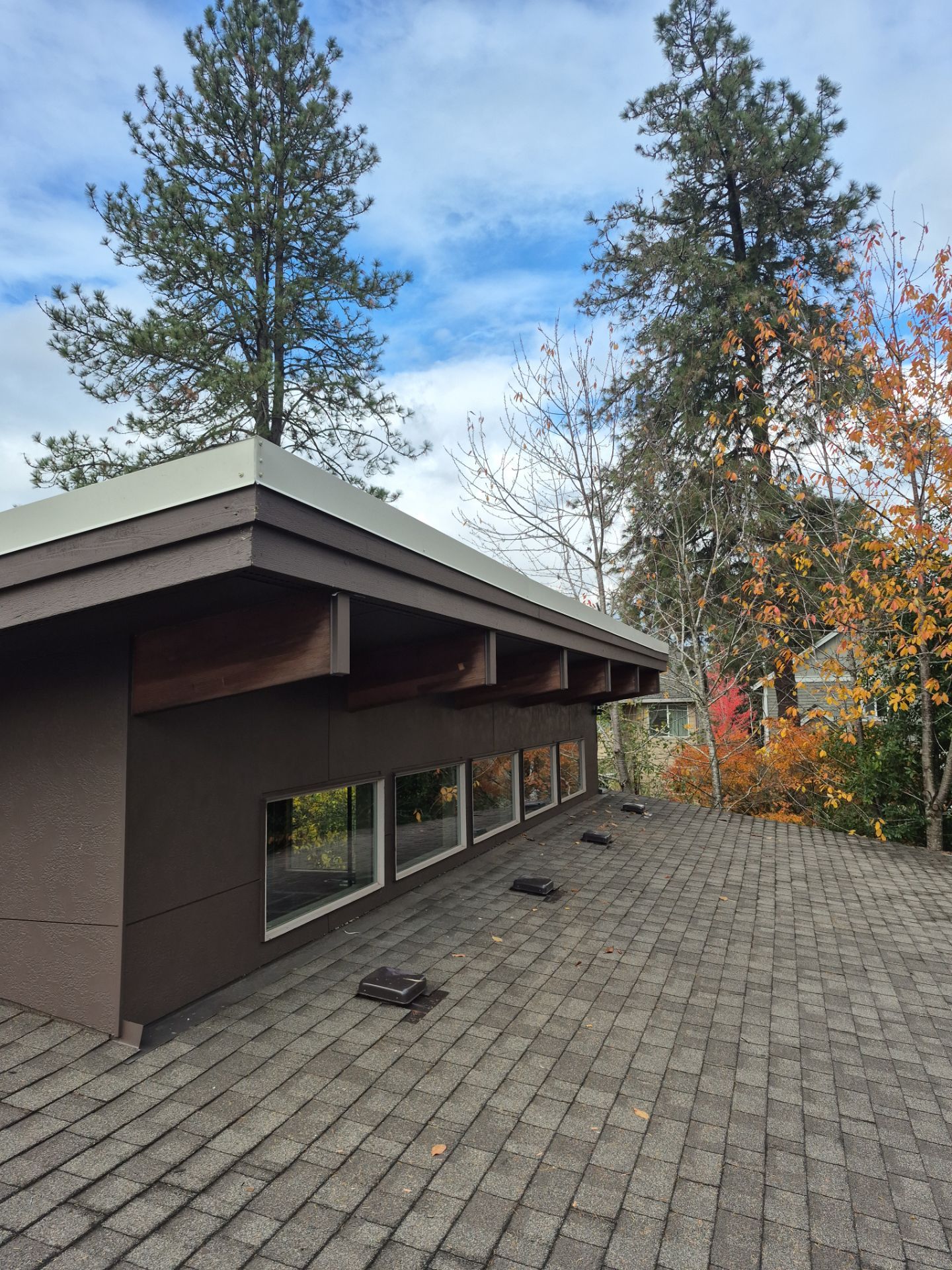New Metal Roof and replace solar panels by Hawthorne General Construction