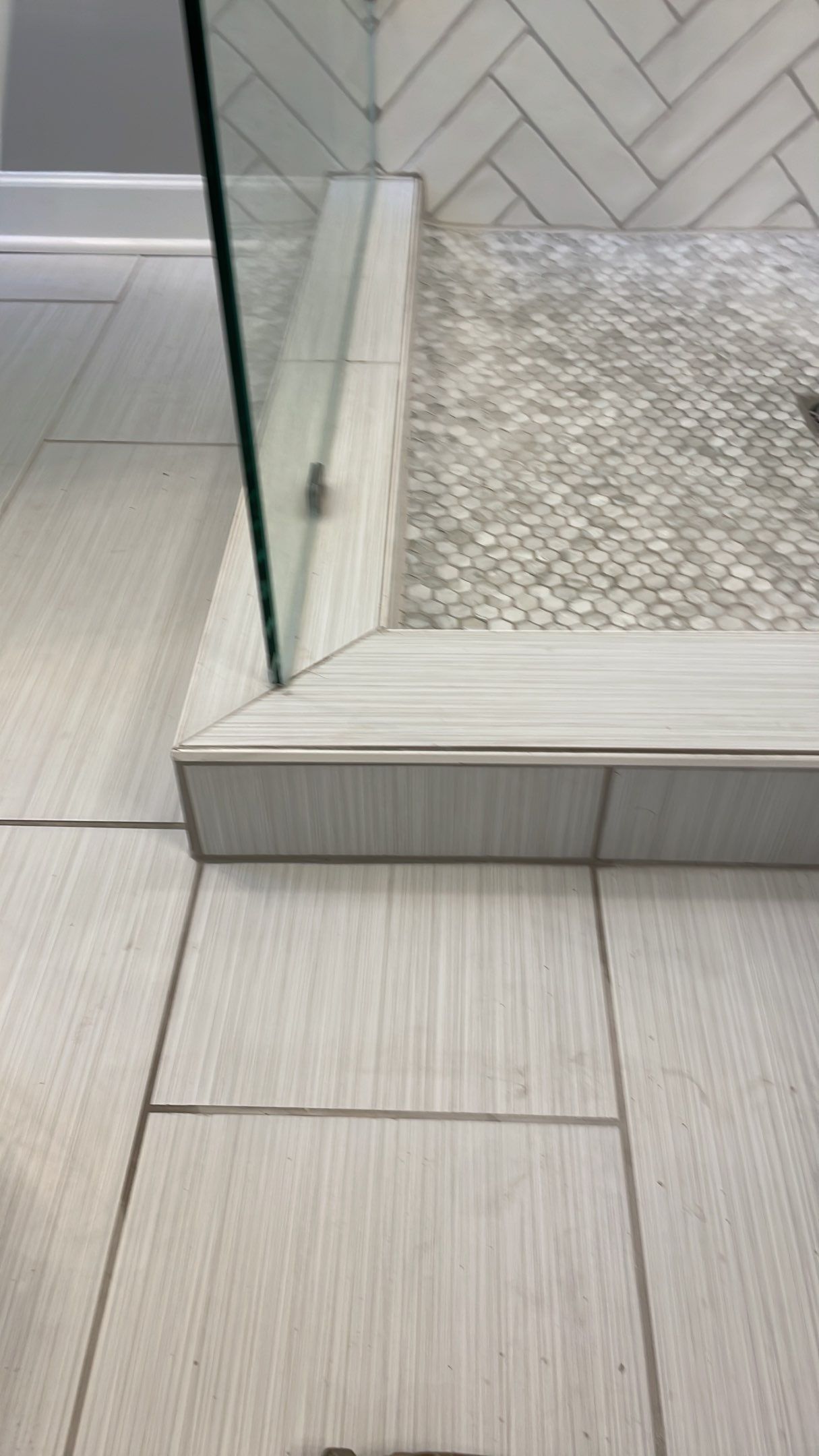 Bathroom Remodel using Schluter by Footprints Floors of Coastal Carolina