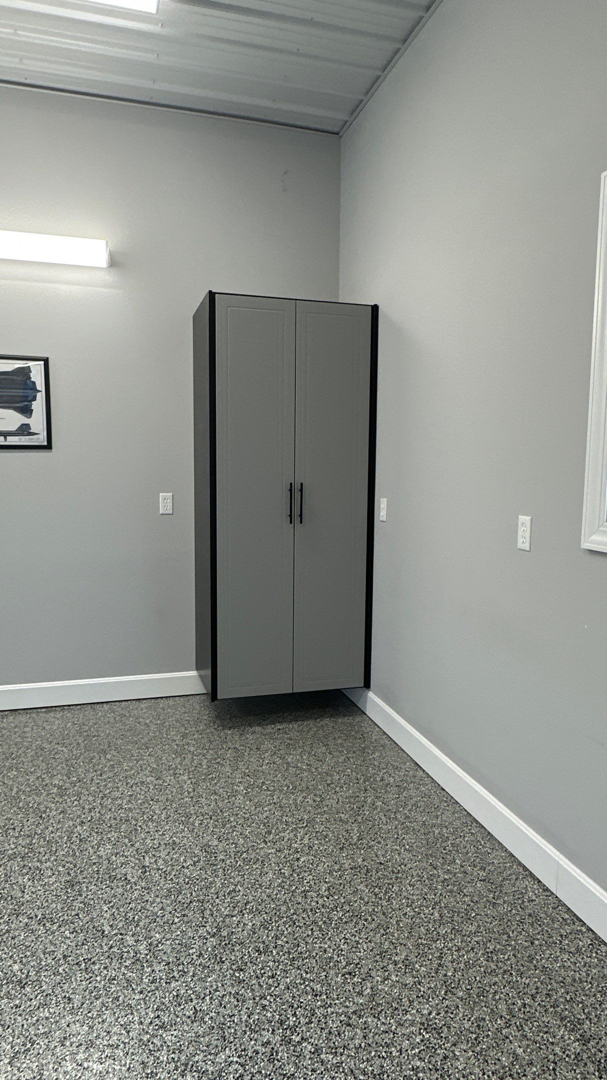 Pat F upgraded his garage with a cool Two-tone cabinet setup by Banner Garage