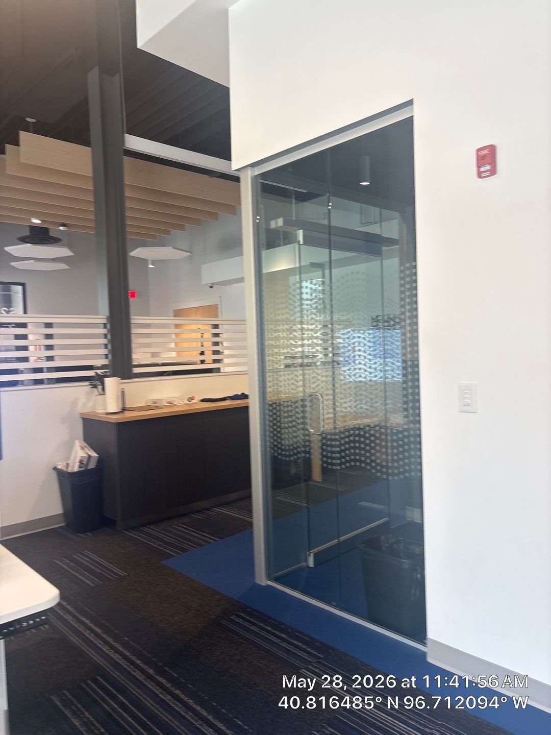 Modern Office Remodel with Acoustic Baffles and Glass Partitions by CompanyCam Sales Demo