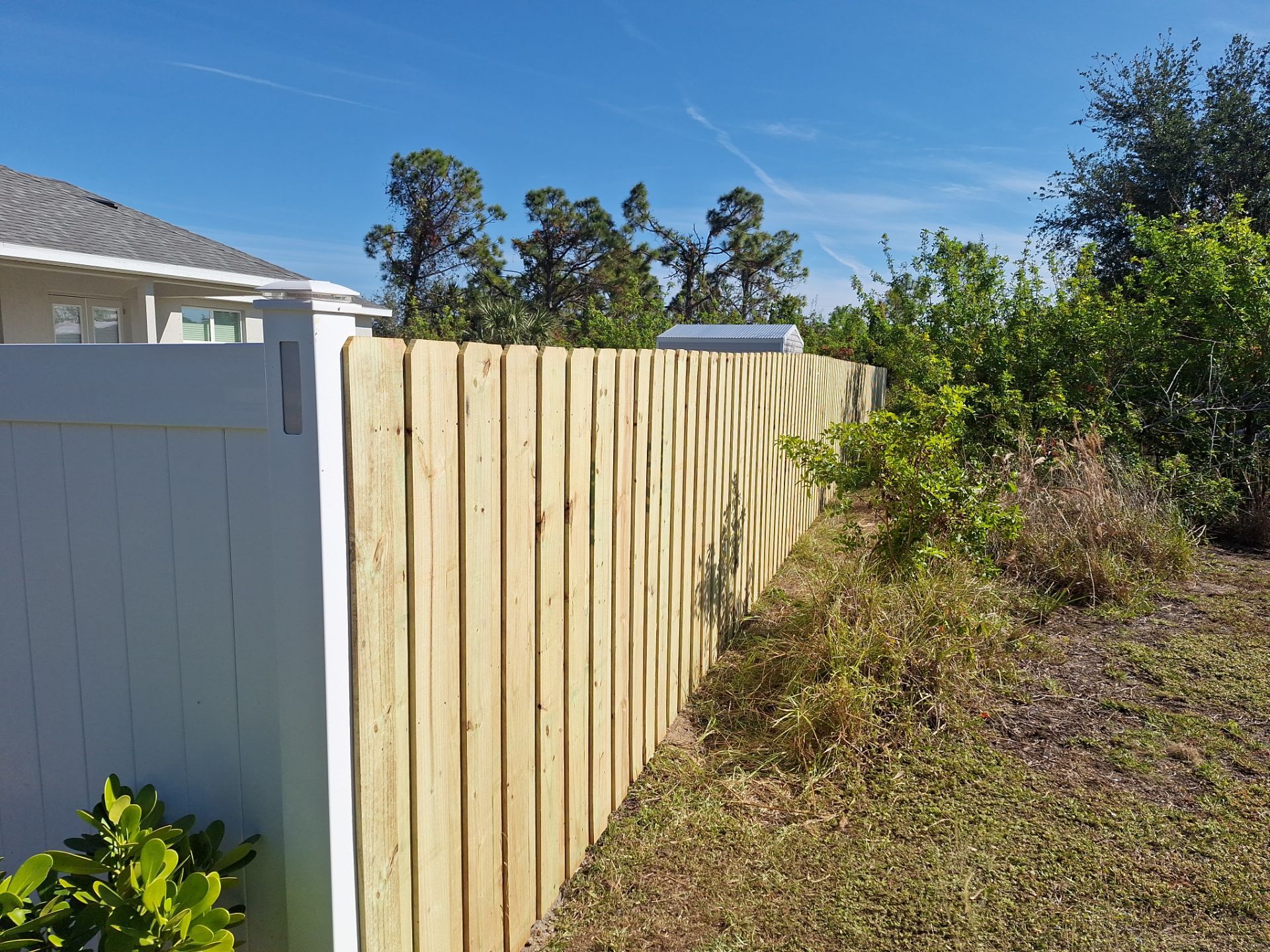 Wood Fence Installation using 6Ft Pressure Treated Wood Board On Board Privacy Fence by Asap fence and gates, LLC