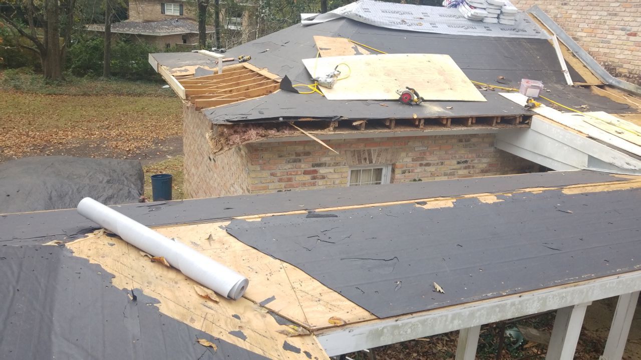 Residential Roofing Installation using Roof Replacement by American Roofing & Construction LLC