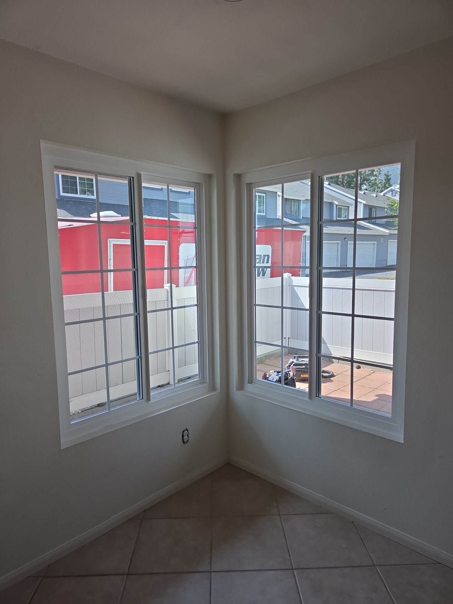 Window Installation using Milgard V300 Trinsic with grids by American Window Company