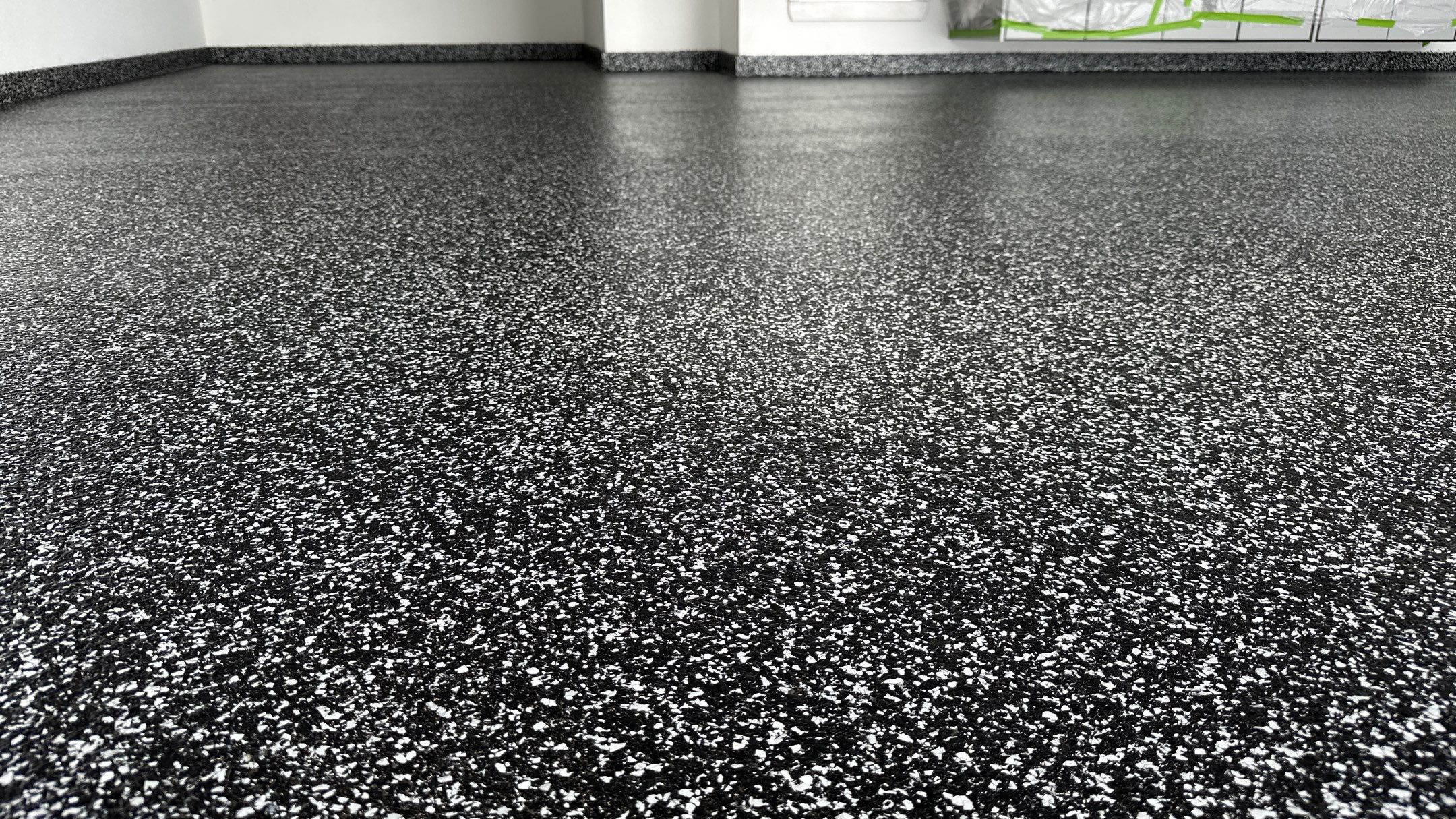 John H. received his dream garage with cabinets and a Banner Garage Floor by Banner Garage