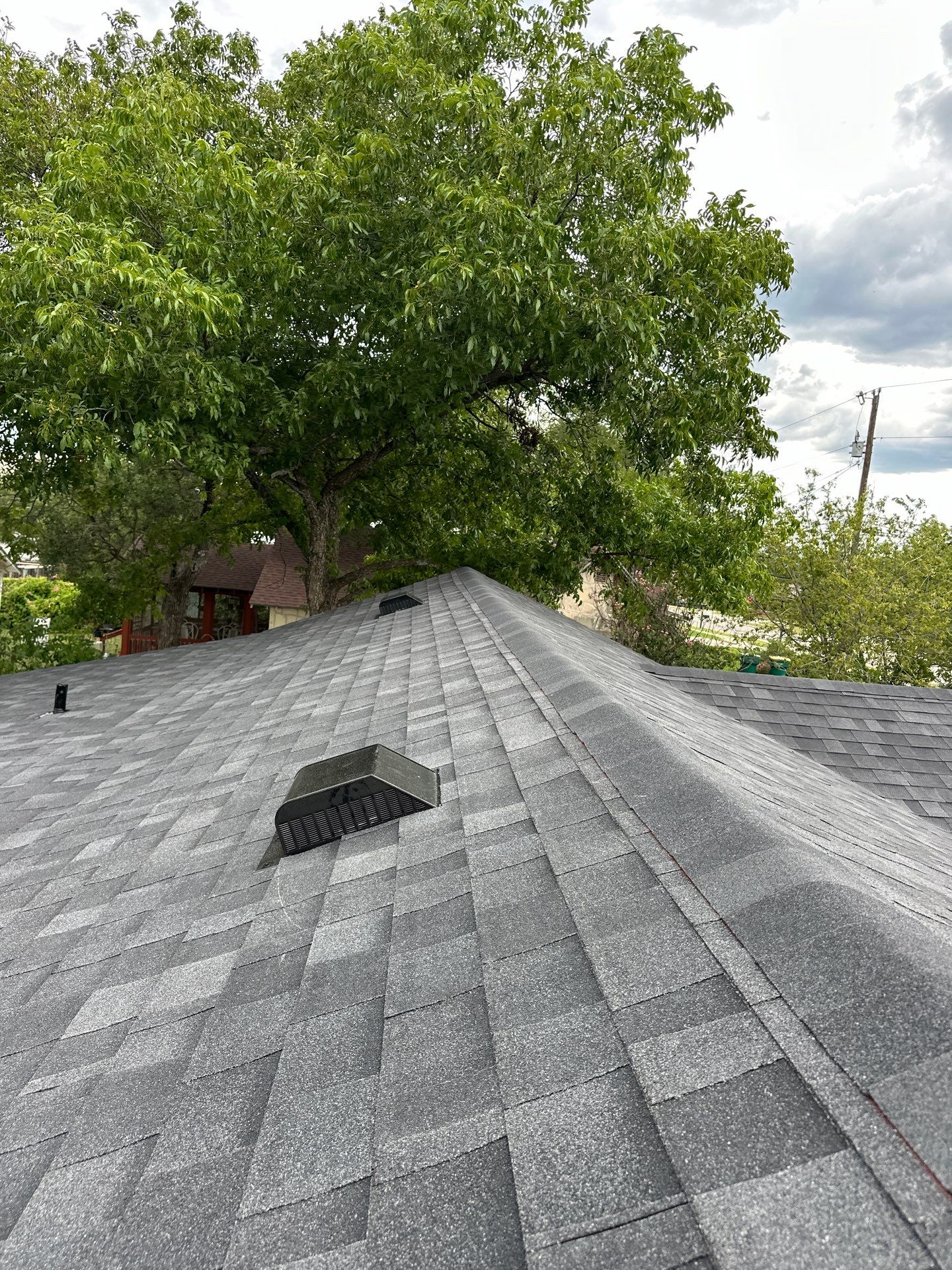 Residential Roofing Installation using Owens Corning Oakridge Onyx Black by DeZign Roofing & Exteriors
