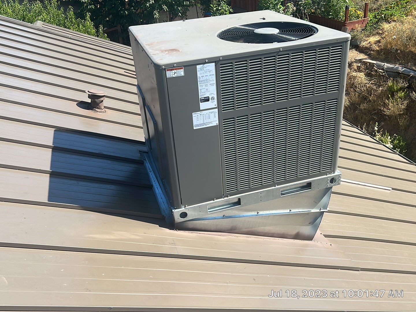 Metal roofing installation using ASC Standing Seam metal by Straight Edge Roofing Inc