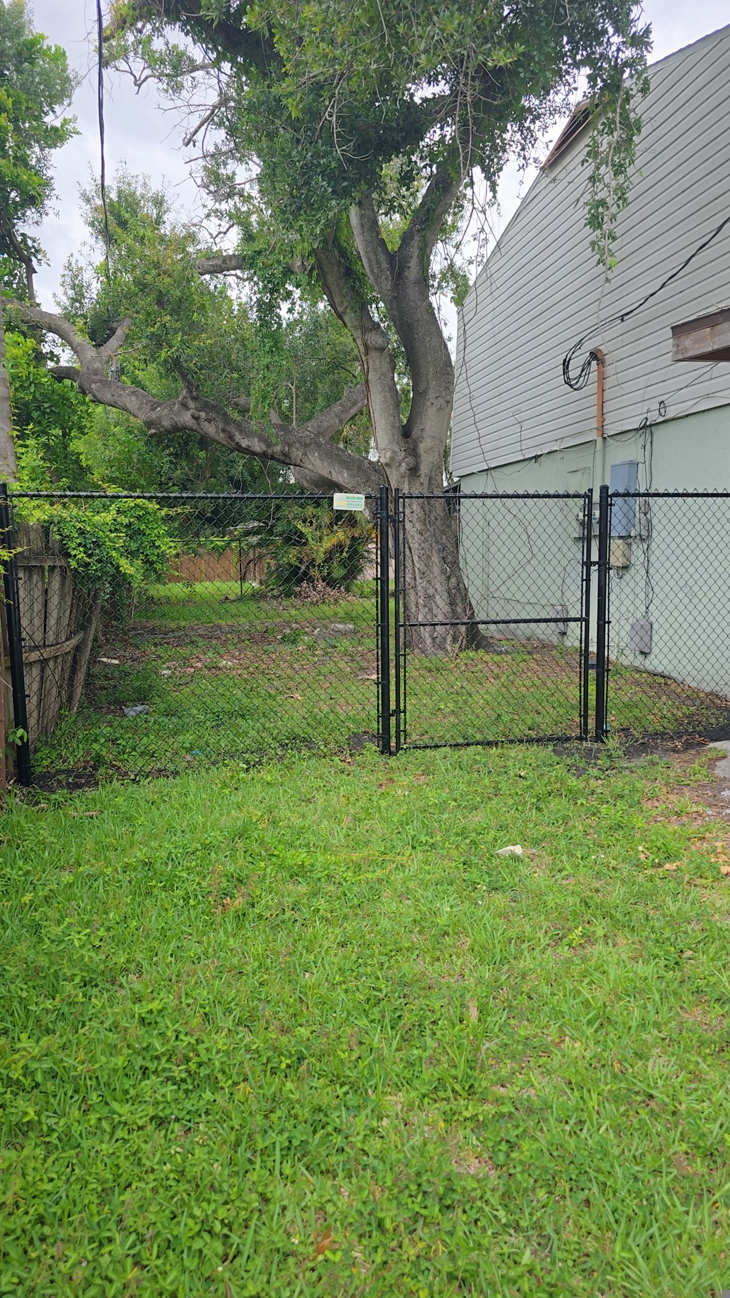 Black Vinyl Chain Link Fence Installation in Bradenton by True Fence LLC