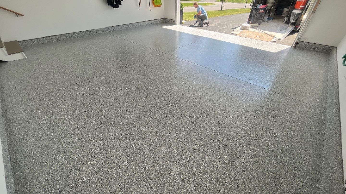 Garage in Londonderry, NH 03053 by Symphony Concrete Coatings