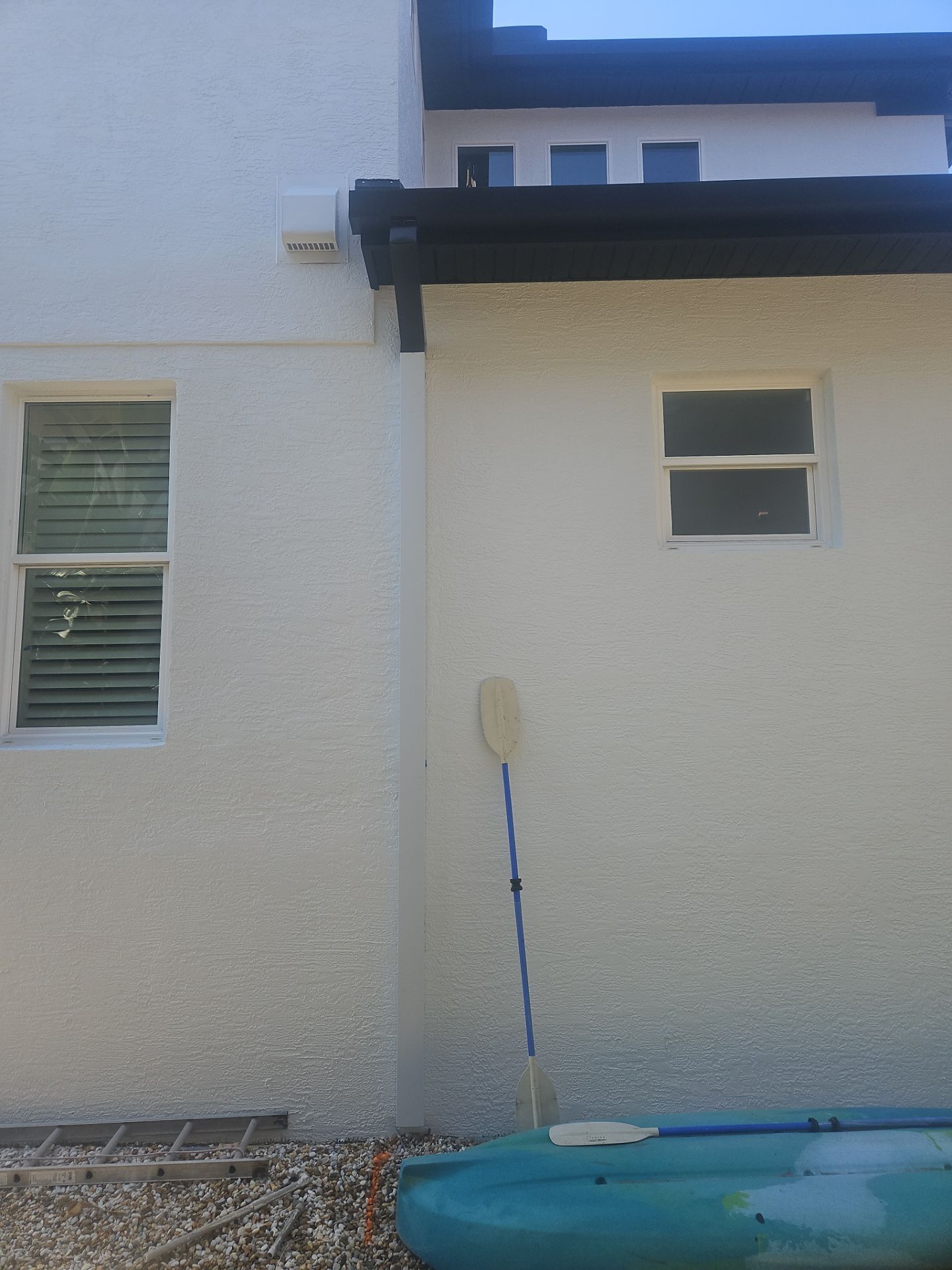 Soffit and Fascia Installation and black seamless gutters in Sarasota FL by Gutter Professors