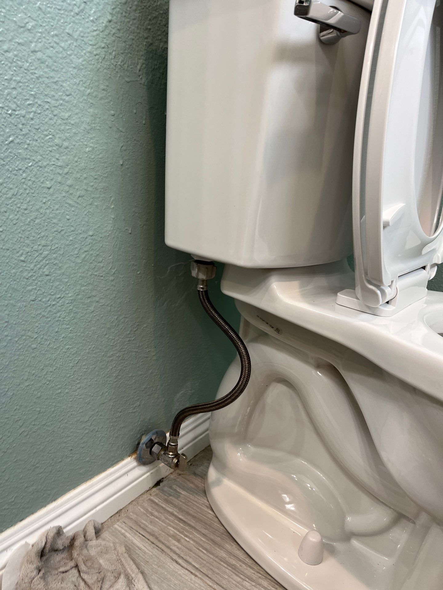 Installed Toilet and Shower Fixtures by Us Plumbing 