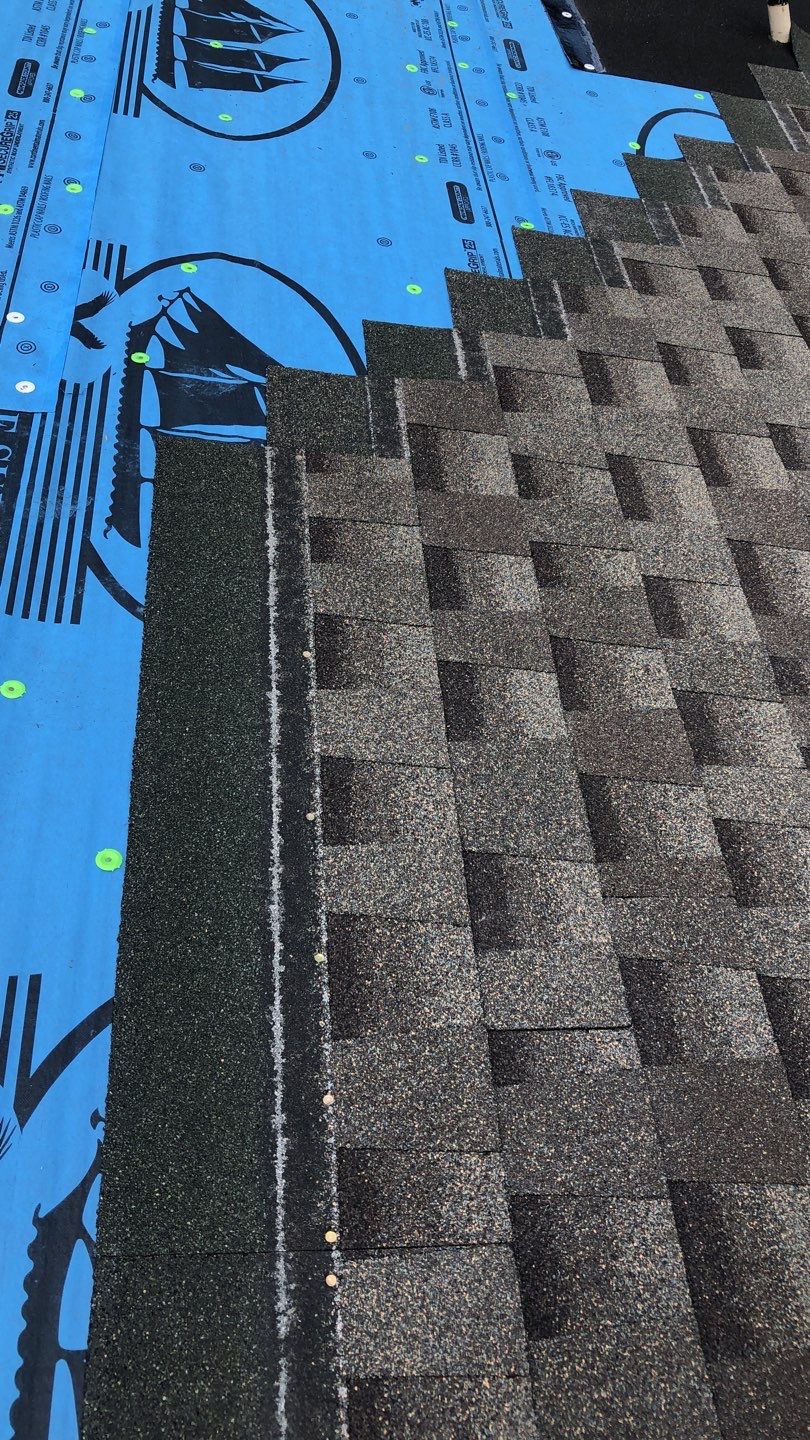 Residential Roofing Installation using Roof Replacement by American Roofing & Construction LLC